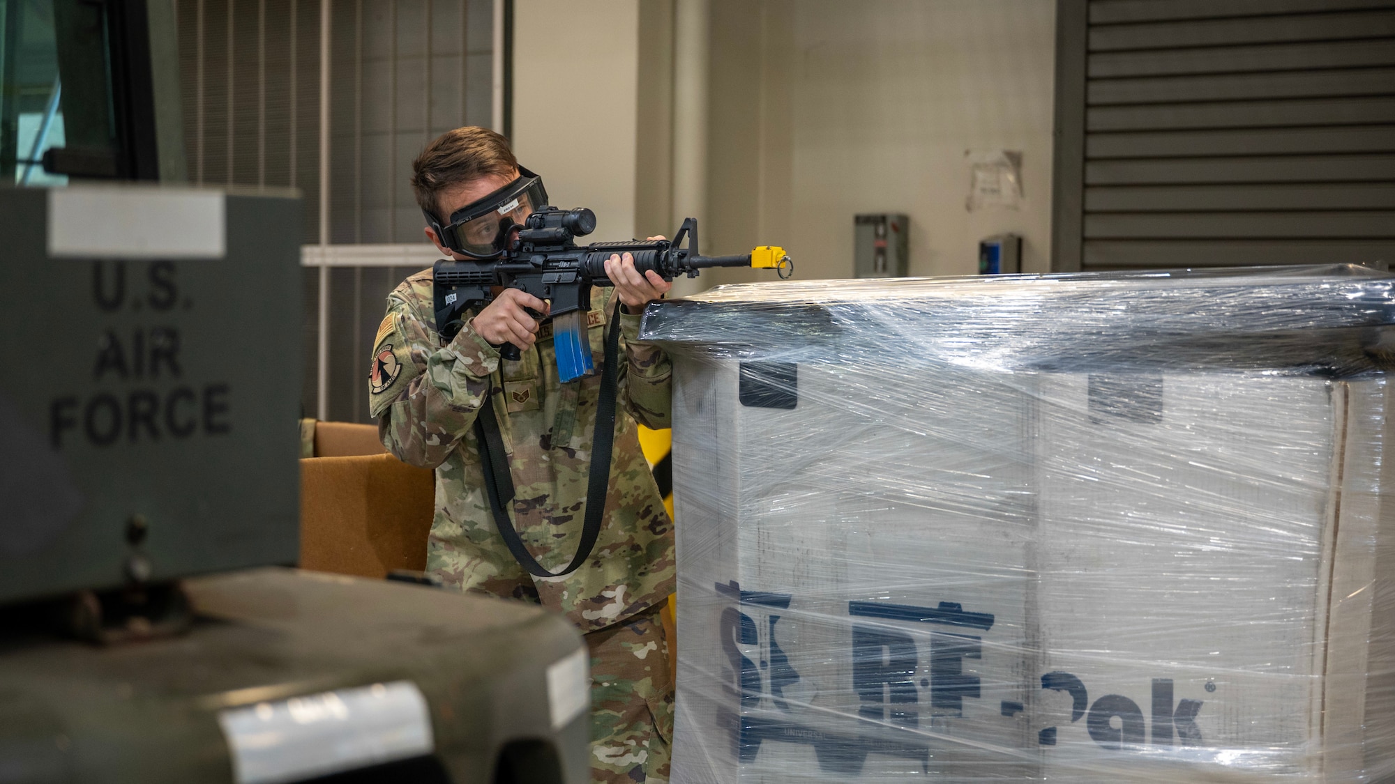 U.S. Air Force Staff Sgt. Kyle Chappell, 731st Air Mobility Squadron Air Terminal Operations Center, participates in asset defense training during MUSTANG RODEO 26-1 at Osan Air Base, Republic of Korea, Dec. 9, 2025. MUSTANG RODEO is a week of focused unit training where squadrons plan and execute part task events to practice the skills Osan Airmen need during contingency operations. (U.S. Air Force photo by Staff Sgt. Sarah Williams)