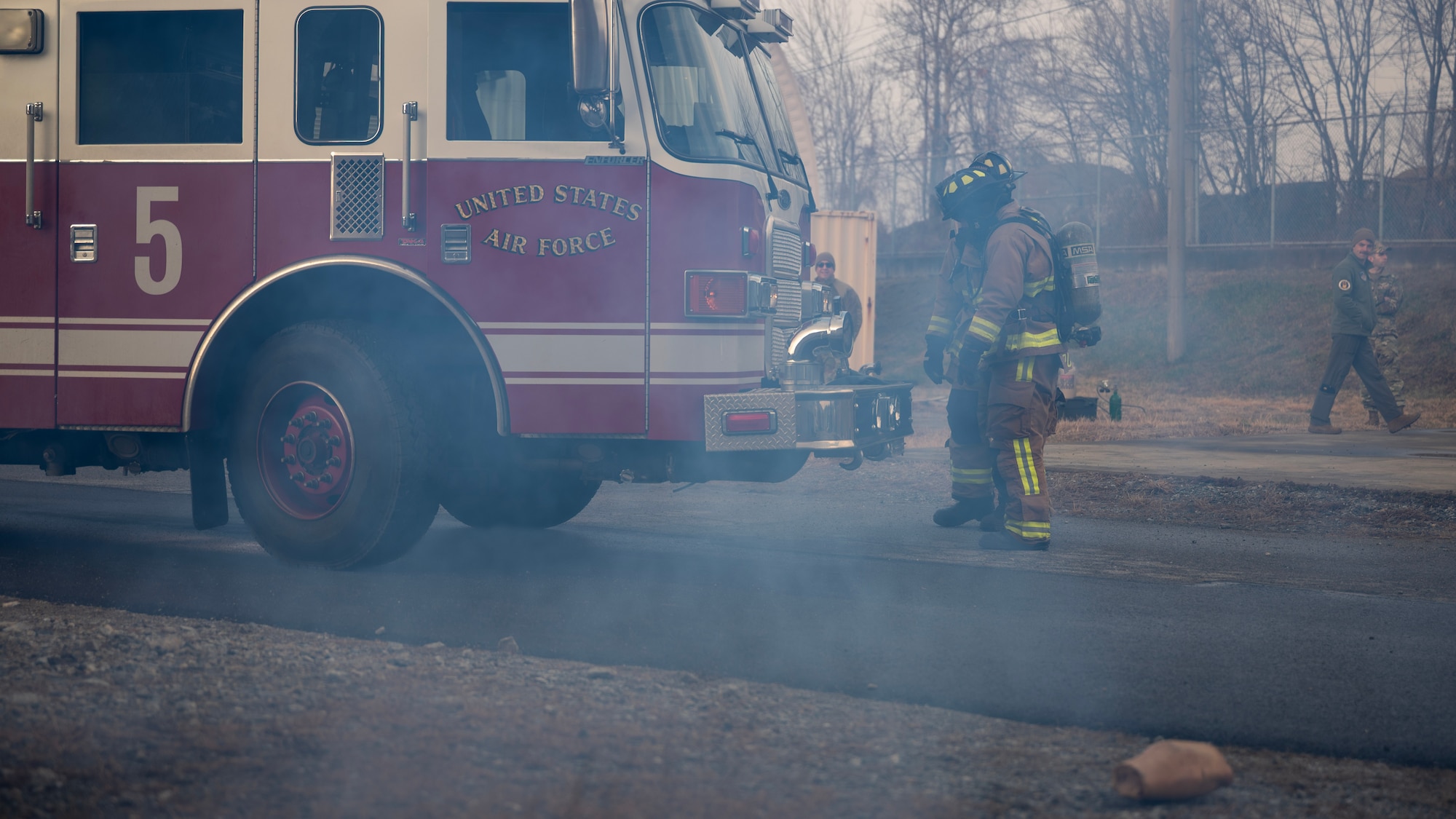 Members of the 51st Civil Engineer Squadron fire department participate in a Tactical Combat Casualty Care exercise during MUSTANG RODEO 26-1 at Osan Air Base, Republic of Korea, Dec. 10, 2025. MUSTANG RODEO provides regular opportunities for Airmen to rehearse targeted skill sets and bridge the gap between large-scale events, ensuring that critical tasks are performed with speed and precision, even when operating under limited time or simulated operational stress. (U.S. Air Force photo by Staff Sgt. Sarah Williams)
