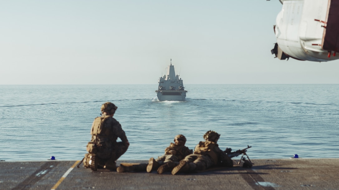 San Antonio-class amphibious transport dock ship USS Portland (LPD 27) sails during a simulated strait transit in the Pacific Ocean, Dec. 7, 2025. The simulated strait transit was conducted to refine the 11th Marine Expeditionary Unit’s ability to integrate with the Navy for enhanced force protection. The 11th MEU is currently underway aboard the Boxer Amphibious Ready Group in the U.S. 3rd Fleet area of operations conducting integrated training that enhances lethality and warfighting readiness. (U.S. Marine Corps photo by Sgt. Joseph Helms)