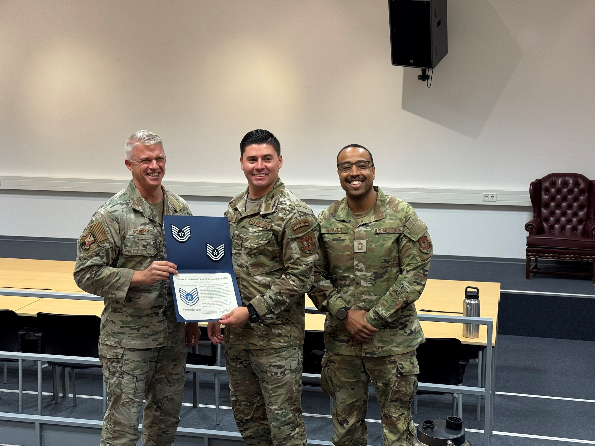 U.S. Air Force Staff Sgt. Brayan Arroyo-Arias, 435th Security Forces Squadron administration and assessments section chief, was promoted to technical sergeant through the Stripes for Exceptional Performers program, by Col. Jayson Schmiedt, 435th Air Ground Operations Wing deputy commander, and Chief Master Sgt. Ronald Weaver, 435th SFS senior enlisted leader, December 9, 2025.
