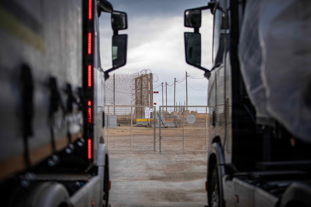 Trucks carrying humanitarian aid are staged at the Zikim Crossing Point on Nov. 25, 2025, in Israel. The United States is working with the international community to facilitate the flow of humanitarian assistance to civilians in Gaza. (U.S. Army photo by Staff Sgt. Mike Ito)