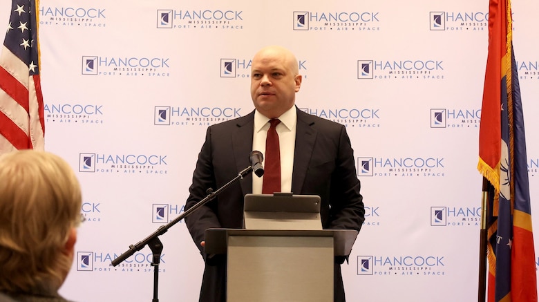 Assistant Secretary of the Army for Civil Works Adam Telle speaks during the ribbon cutting and Memorandum of Understanding signing ceremony at the Stennis Airport in Kiln, Mississippi, December 5, 2025. The new I-ATLAS takes the place of the old JALBTCX and combines USACE, ERDC, the Naval Meteorology and Oceanography Command, NOAA, and the U.S. Geological Survey. (U.S. Army photo by Keesha Robinson)