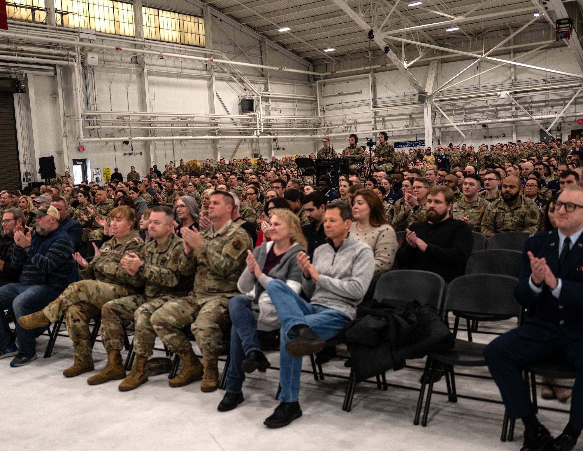 U.S. Air Force Airmen from the 133rd Airlift Wing, along with family, community partners, and volunteers, attend the annual Wing Awards Ceremony in St. Paul, Minn., Dec. 6, 2025.