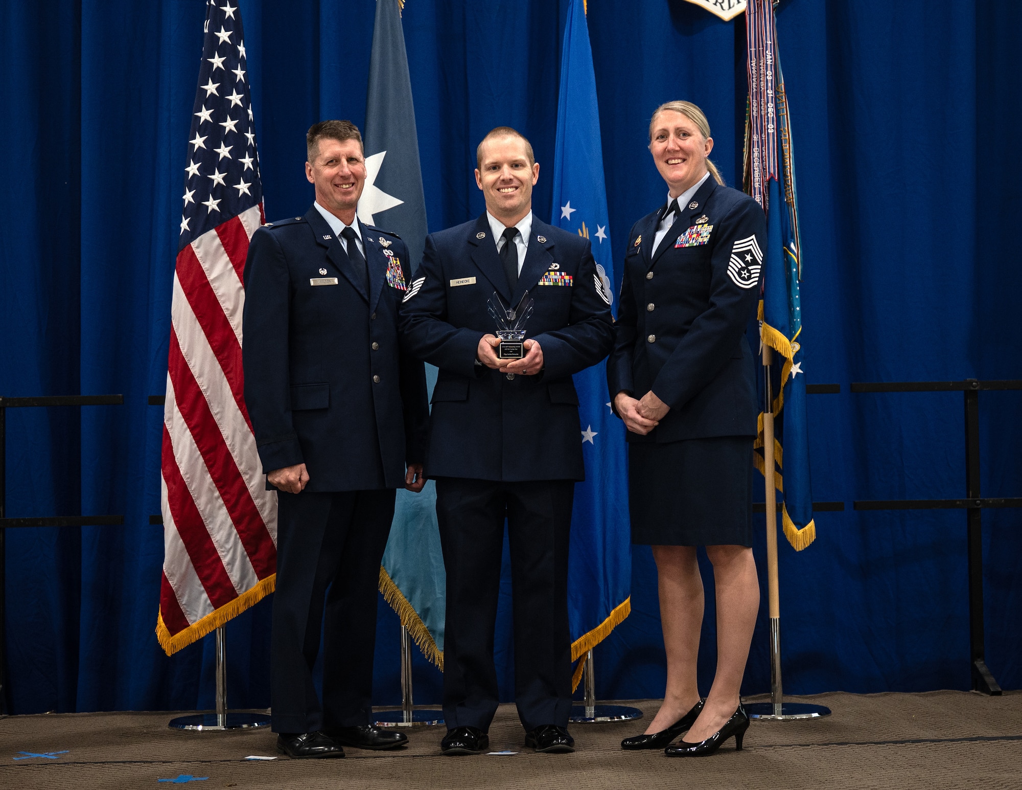 U.S. Air Force Tech. Sgt. Jordan Heinecke, 133rd Mission Support Group, accepts the Outstanding Airman of the Year award for the non-commissioned officer category in St. Paul, Minn., Dec. 6, 2025.