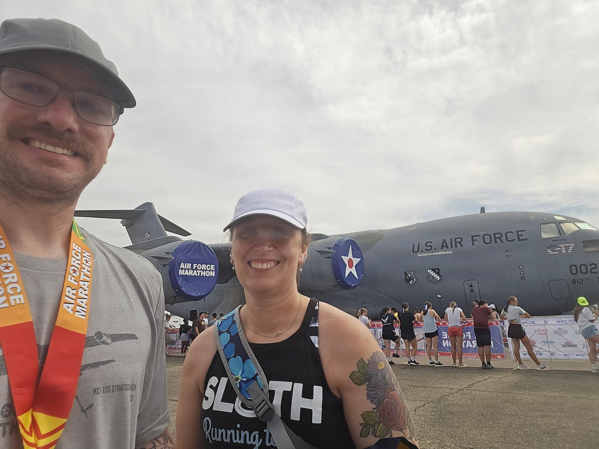 Master Sgt. Christopher Massengill of the 168th Wing takes a selfie with his wife during the Air Force Marathon festivities after running both the Air Force half-marathon and the 5K.