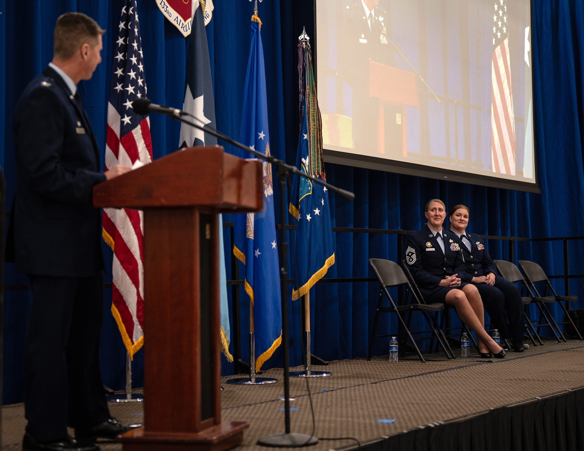 U.S. Air Force Airmen from the 133rd Airlift Wing, along with family and friends attend the assumption of responsibility ceremony for the 16th Command Chief Master Sgt., in St. Paul, Minn., Dec. 6, 2025.