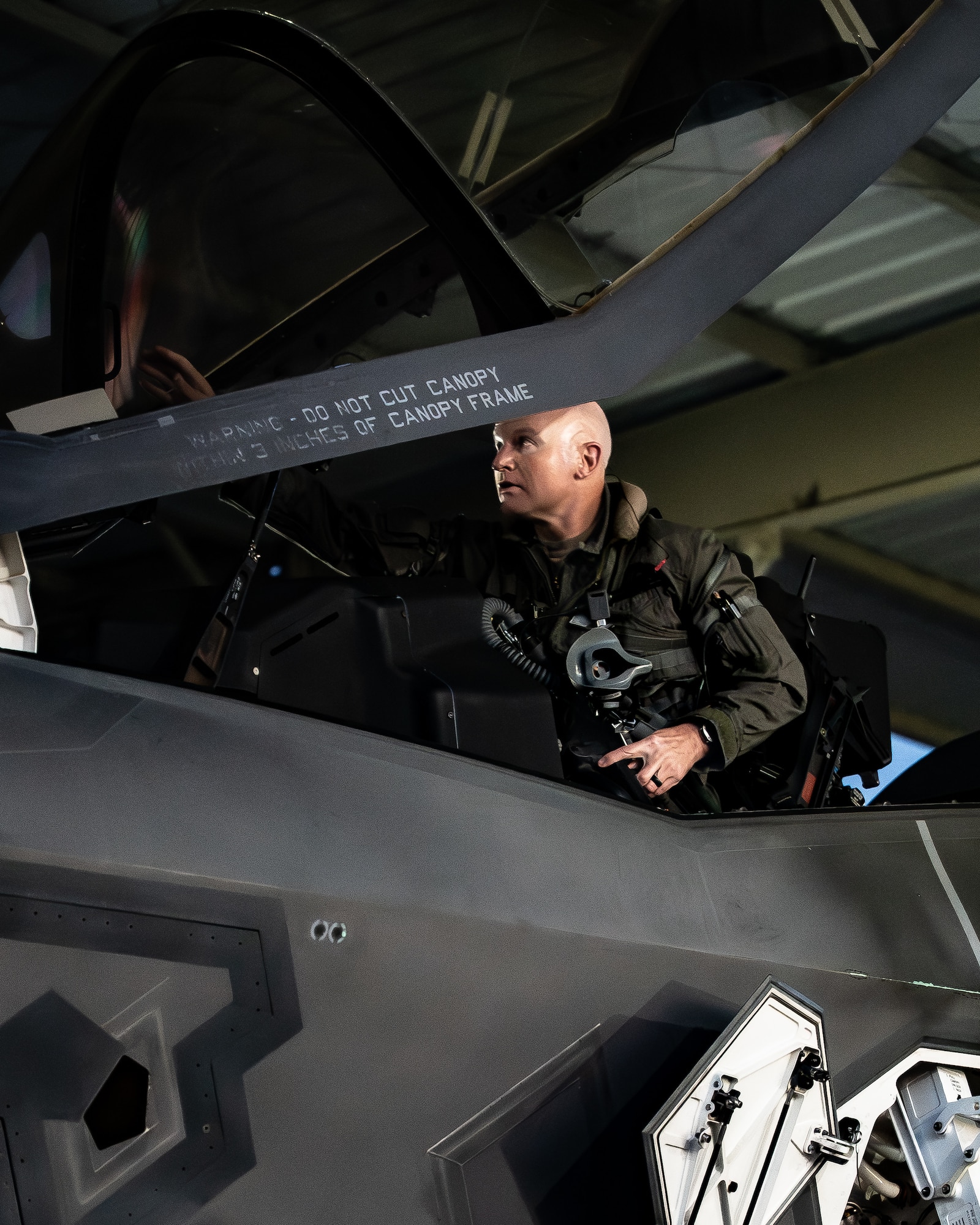 U.S. Air Force Brig. Gen. David Berkland, 56th Fighter Wing commander, exits from an F-35A Lightning II