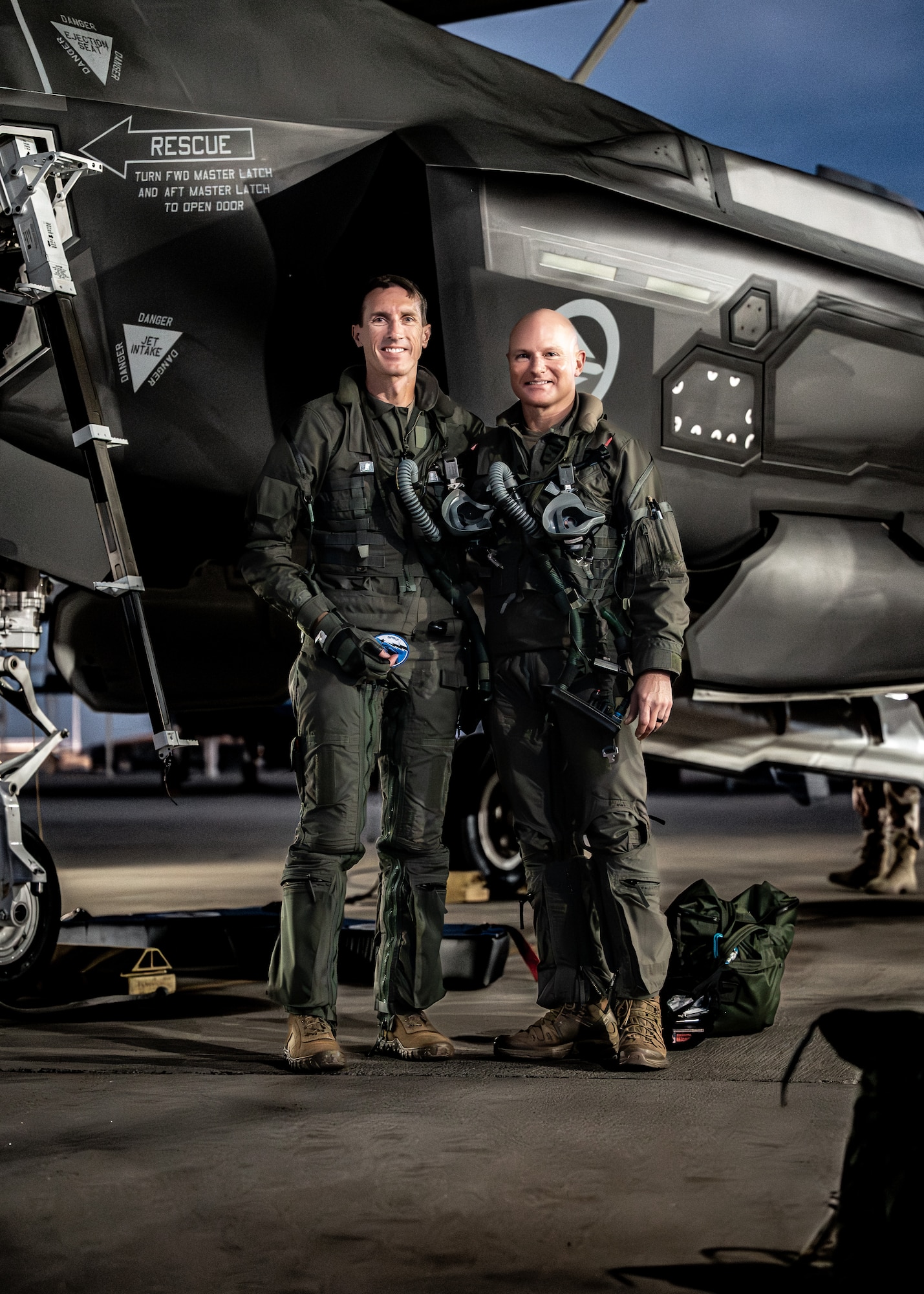 U.S. Air Force Brig. Gen. David Epperson (left), USAF Warfare Center commander, and Brig. Gen. David Berkland, 56th Fighter Wing commander, pose for a photo