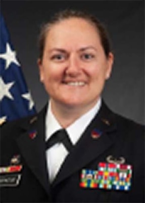 Photo of a female soldier in dress uniform