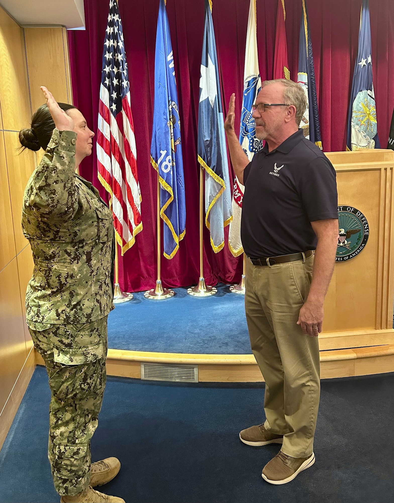 Thomas Casey recites the oath of enlistment on Dec 11, 2025 at the Fort Snelling Military Entrance Processing Station in Minneapolis, Minnesota. Casey started his Air Force career in 1991 as a pavements and construction specialist and retired in 2012 as a military entrance processing station liaison in Minnesota before returning to active duty through the Voluntary Retired Return to Active Duty program in 2025. (courtesy photo)