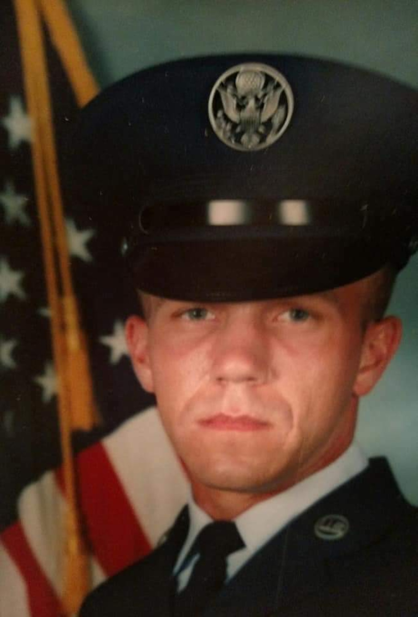 Thomas Casey stands for his first-ever official photo at basic military training at Lackland Air Force Base, Texas, in 1991. Casey started his Air Force career in 1991 as a pavements and construction specialist and retired in 2012 as a military entrance processing station liaison in Minnesota before returning to active duty through the Voluntary Retired Return to Active Duty program in 2025. (courtesy photo)