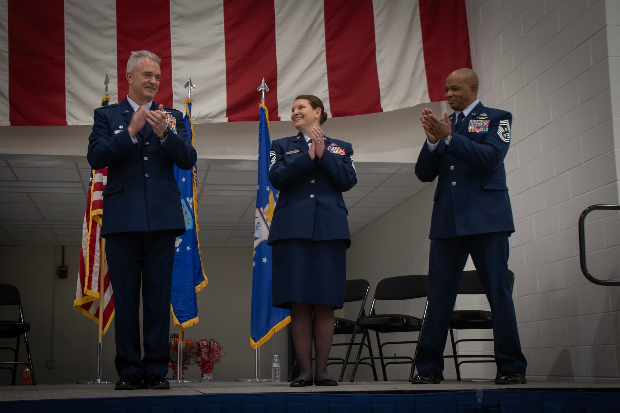 Chief Master Sgt. Ed Taylor, command chief master sergeant of the 179th Cyberspace Wing, relinquished authority to Chief Master Sgt. Kari Nettle, incoming command chief master sergeant of the 179th Wing, during a change-of-authority ceremony Dec. 7, 2025, at the 179th Cyberspace Wing in Mansfield, Ohio. Nettle will officially begin her duties immediately as the wing continues its transition to a cyberspace-focused mission. (U.S. Air force photo by Tech Sgt. Alyssa Reik)
