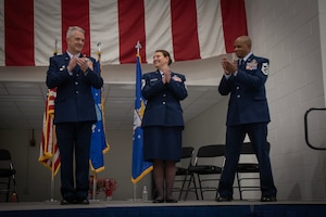 Chief Master Sgt. Ed Taylor, command chief master sergeant of the 179th Cyberspace Wing, relinquished authority to Chief Master Sgt. Kari Nettle, incoming command chief master sergeant of the 179th Wing, during a change-of-authority ceremony Dec. 7, 2025, at the 179th Cyberspace Wing in Mansfield, Ohio. Nettle will officially begin her duties immediately as the wing continues its transition to a cyberspace-focused mission. (U.S. Air force photo by Tech Sgt. Alyssa Reik)