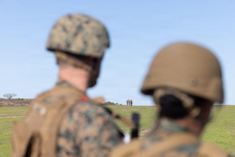 U.S. Marines with Marine Wing Support Squadron 373, Marine Air Control Group 38, 3rd Marine Aircraft Wing, conduct reconnaissance and engineering assessments to identify terrain suitability for future Forward Arming and Refueling Point and logistics sites during Steel Knight 25 on San Clemente Island, California, Dec. 4, 2025. These assessments enable 3d MAW to establish expeditionary aviation support sites across distributed and contested environments. Steel Knight is an annual exercise that strengthens the Navy-Marine Corps team's ability to respond forward, integrate across domains, and sustain Marine Air-Ground Task Force readiness. (U.S. Marine Corps photo by Lance Cpl. Samantha Devine)