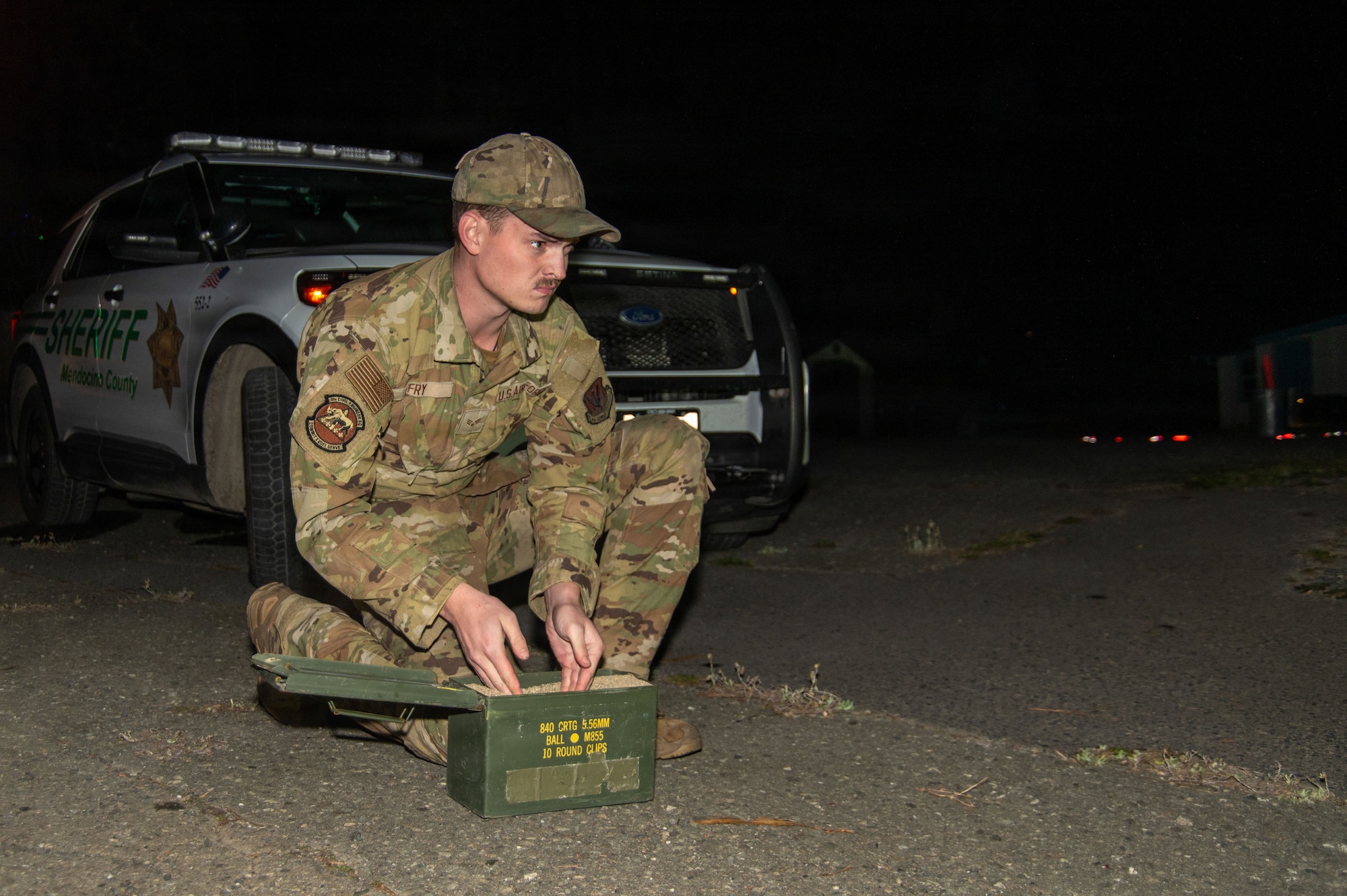U.S. Air Force Senior Airman Ace Fry, 9th Civil Engineer Squadron (CES) Explosive Ordnance Disposal (EOD) technician, prepares a container to move an Unexploded Ordnance (UXO) in Gualala, California, Dec. 9, 2025.