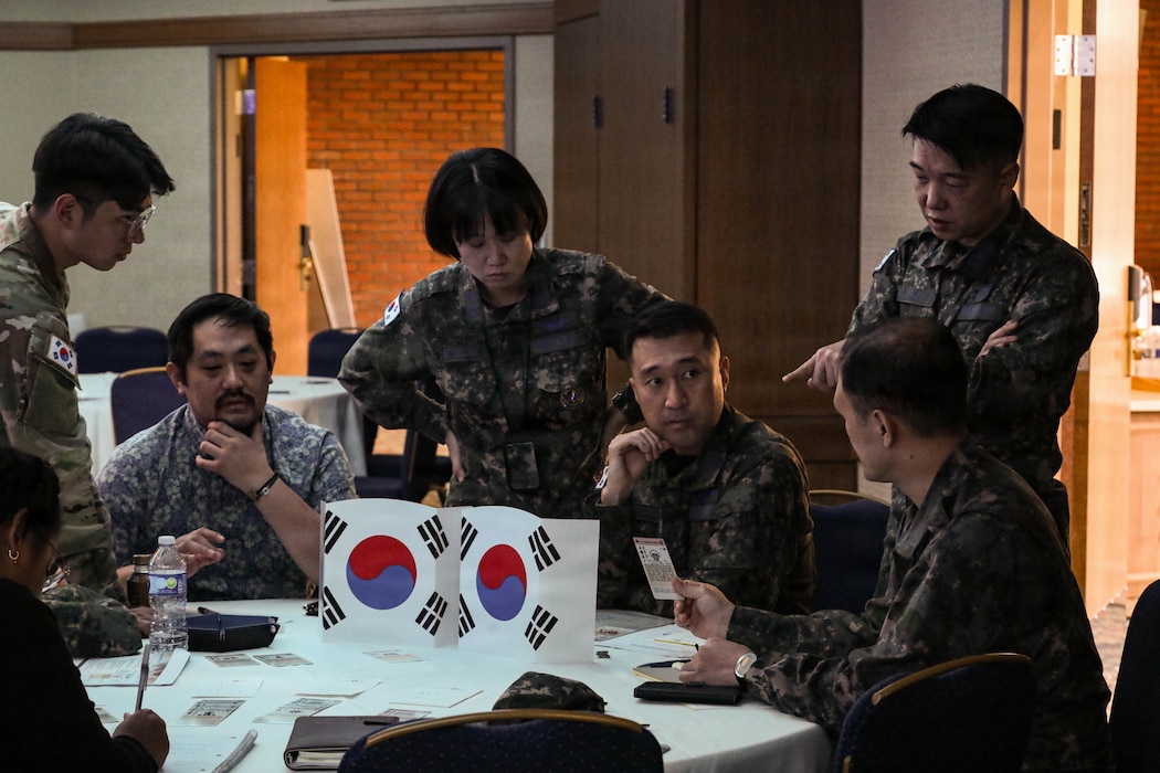 Republic of Korea Air Force officers collaborate during the U.S. Forces Korea Information Operations Wargame, working through scenario-driven challenges designed to sharpen regional strategy and strengthen combined understanding of the information environment, Oct 16, 2025.