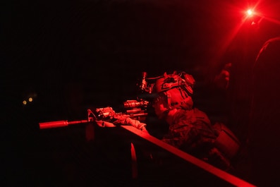 CAMP RODRIGUEZ, SOUTH KOREA (Dec. 8, 2025) — A U.S. Marine with 1st Battalion, 6th Marines, forward deployed with 4th Marine Regiment, 3rd Marine Division as part of the Unit Deployment Program, adjusts their PEQ-15 laser device before conducting a...