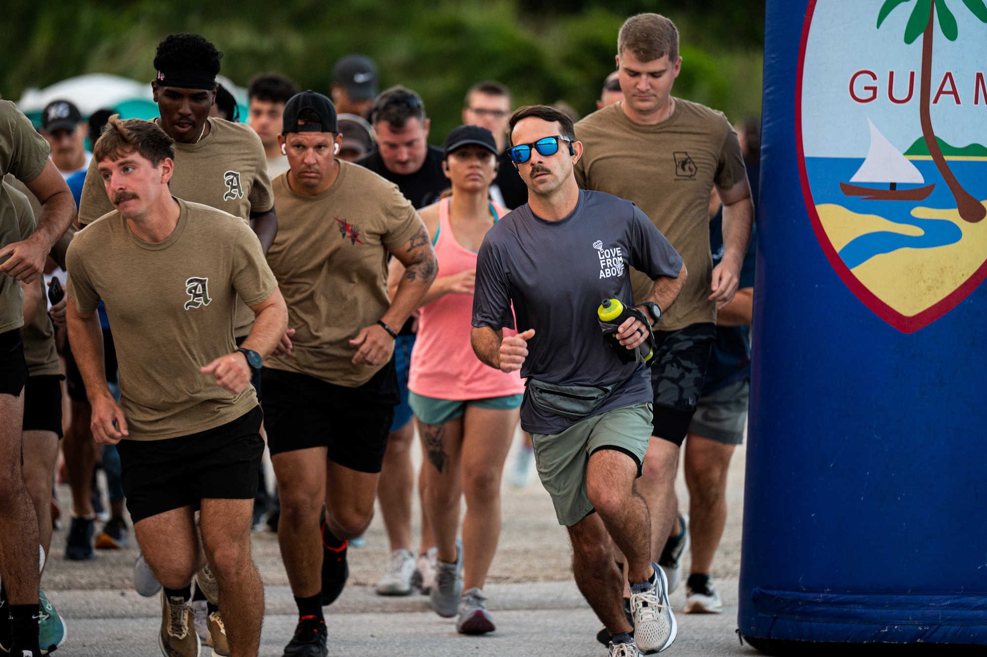 U.S. Air Force Airmen from the 11th Air Task Force gather at the start line before competing in the Turkey Trot 5K/10K run at Andersen Air Force Base, Guam, Nov. 26, 2025.