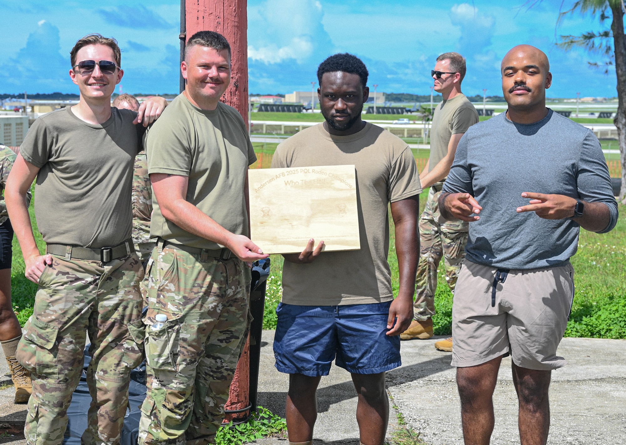 U.S. Air Force Airmen from the 36th Logistics Readiness Squadron push a fuel truck during the last stretch of the fuels rodeo competition at Andersen Air Base, Guam, Oct. 9, 2025.