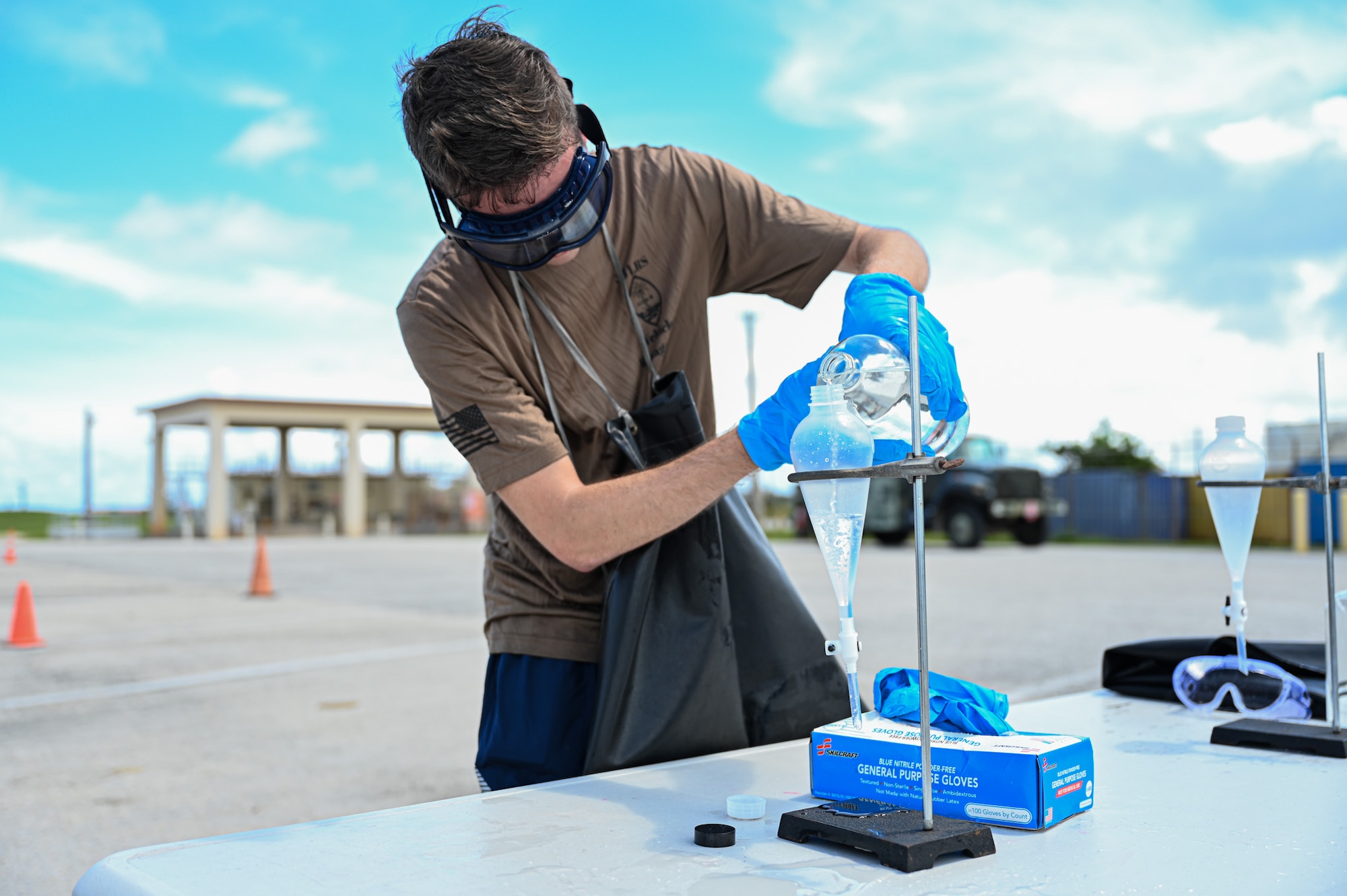 U.S. Air Force Airmen from the 36th Logistics Readiness Squadron push a fuel truck during the last stretch of the fuels rodeo competition at Andersen Air Base, Guam, Oct. 9, 2025.
