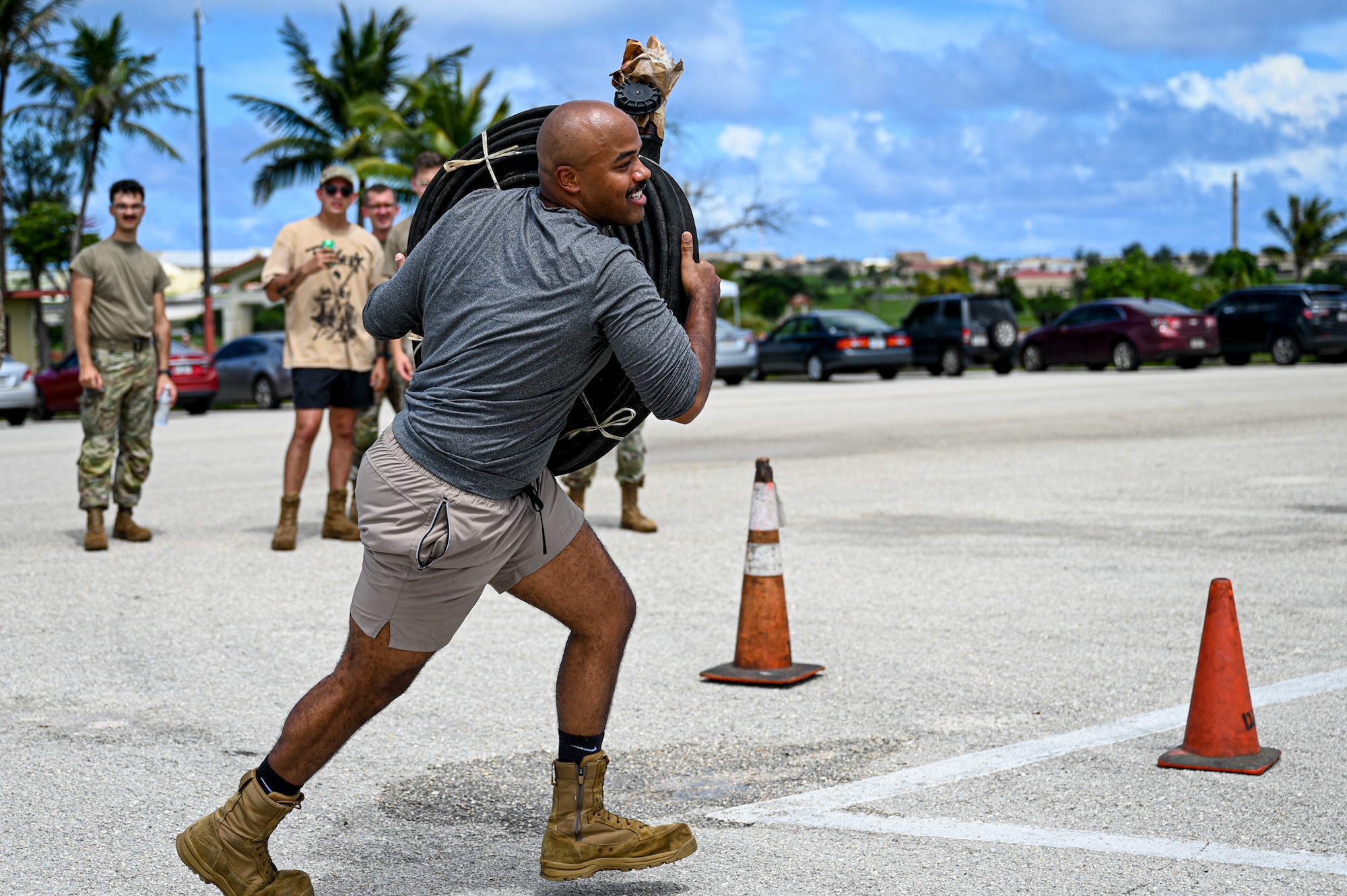 U.S. Air Force Airmen from the 36th Logistics Readiness Squadron push a fuel truck during the last stretch of the fuels rodeo competition at Andersen Air Base, Guam, Oct. 9, 2025.