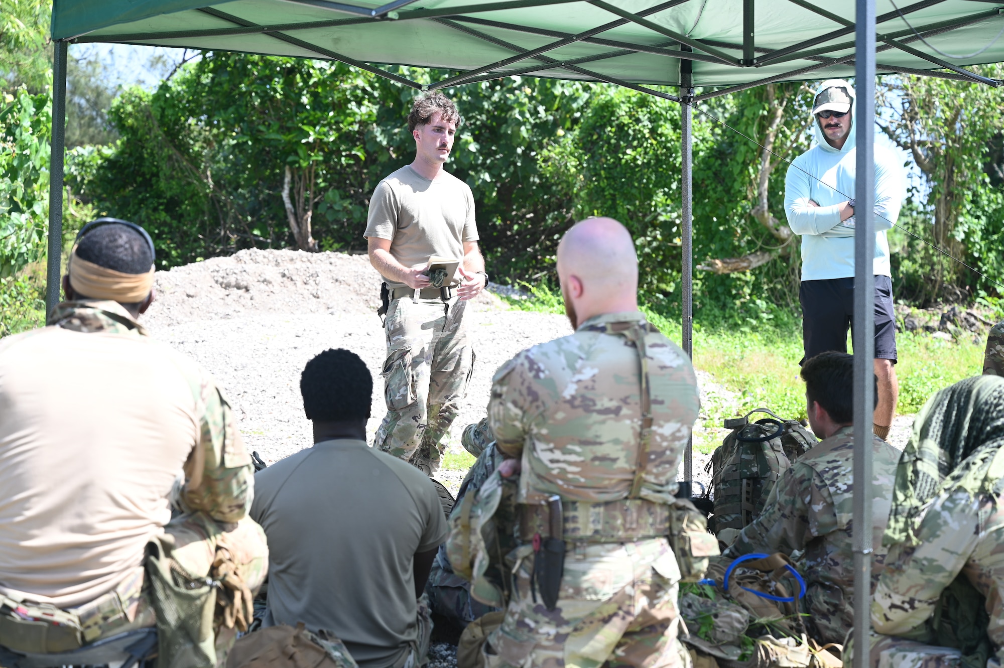 U.S. Air Force Airmen from the 11th Combat Air Base Squadron and the 644th Combat Communications Squadron practice the hands-on portion of survival skills training at Andersen Air Force Base, Guam, Oct. 29 2025.