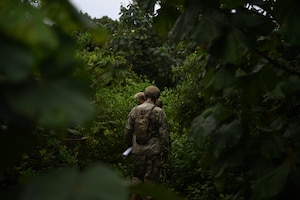 U.S. Air Force Airmen from the 11th Combat Air Base Squadron and the 644th Combat Communications Squadron practice the hands-on portion of survival skills training at Andersen Air Force Base, Guam, Oct. 29 2025.