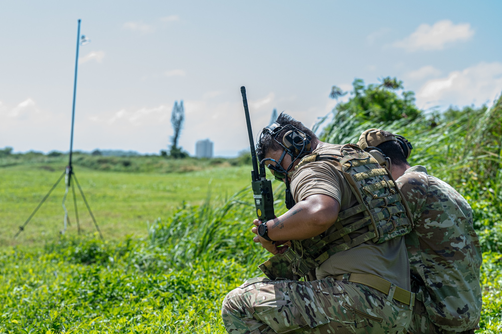 U.S. Air Force Airmen with the 11th Combat Air Base Squadron and 824th Base Defense Squadron prepare for fast-rope insertion training with Helicopter Sea Combat Squadron 25 at Andersen Air Force Base on Nov. 20, 2025.