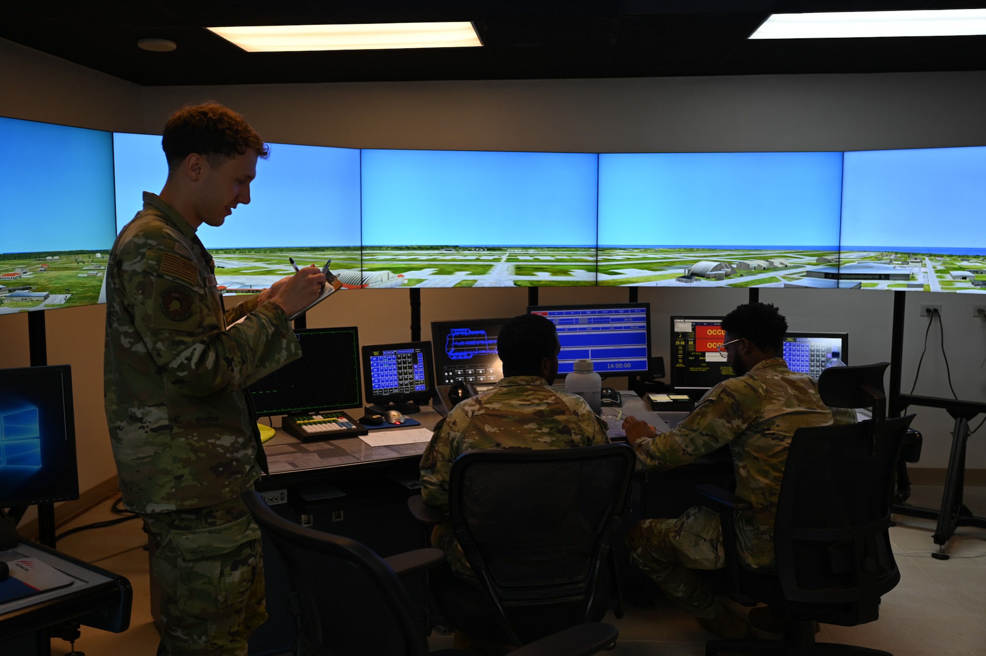 A member from the 36th Operational Support Squadron signs a checklist before beginning training with Airmen from the 11th Combat Air Base Squadron at Anderson Air Base, Guam, Oct. 2, 2025.