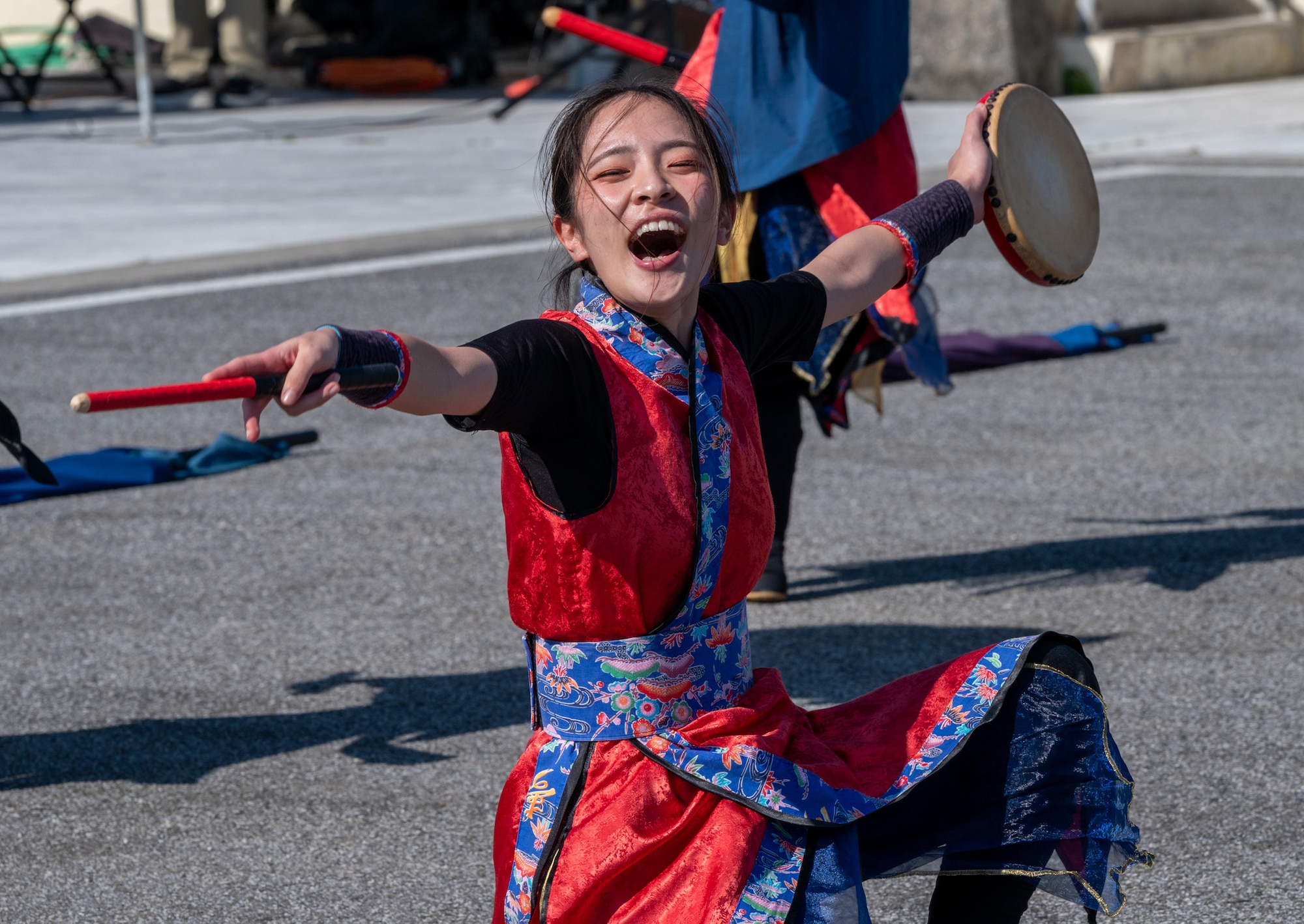 A member of the Firebird Taiko Drummers performs prior to a medal ceremony for the Kadena Special Olympics at Kadena Air Base, Japan, Dec. 6, 2025. Established by the 18th Wing commander in 1999, KSO is a sporting and outreach event providing opportunities for U.S. and Okinawan communities to band together in support of people with disabilities. (U.S. Air Force photo by Senior Airman Erin Currie)