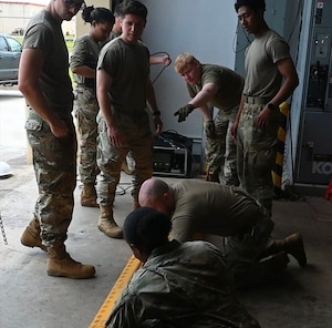 U.S. Air Force Airmen with the 51st Combat Communications Squadron train before participating in exercise Noble Skywave at Andersen Air Force Base, Guam, Oct. 20, 2025.