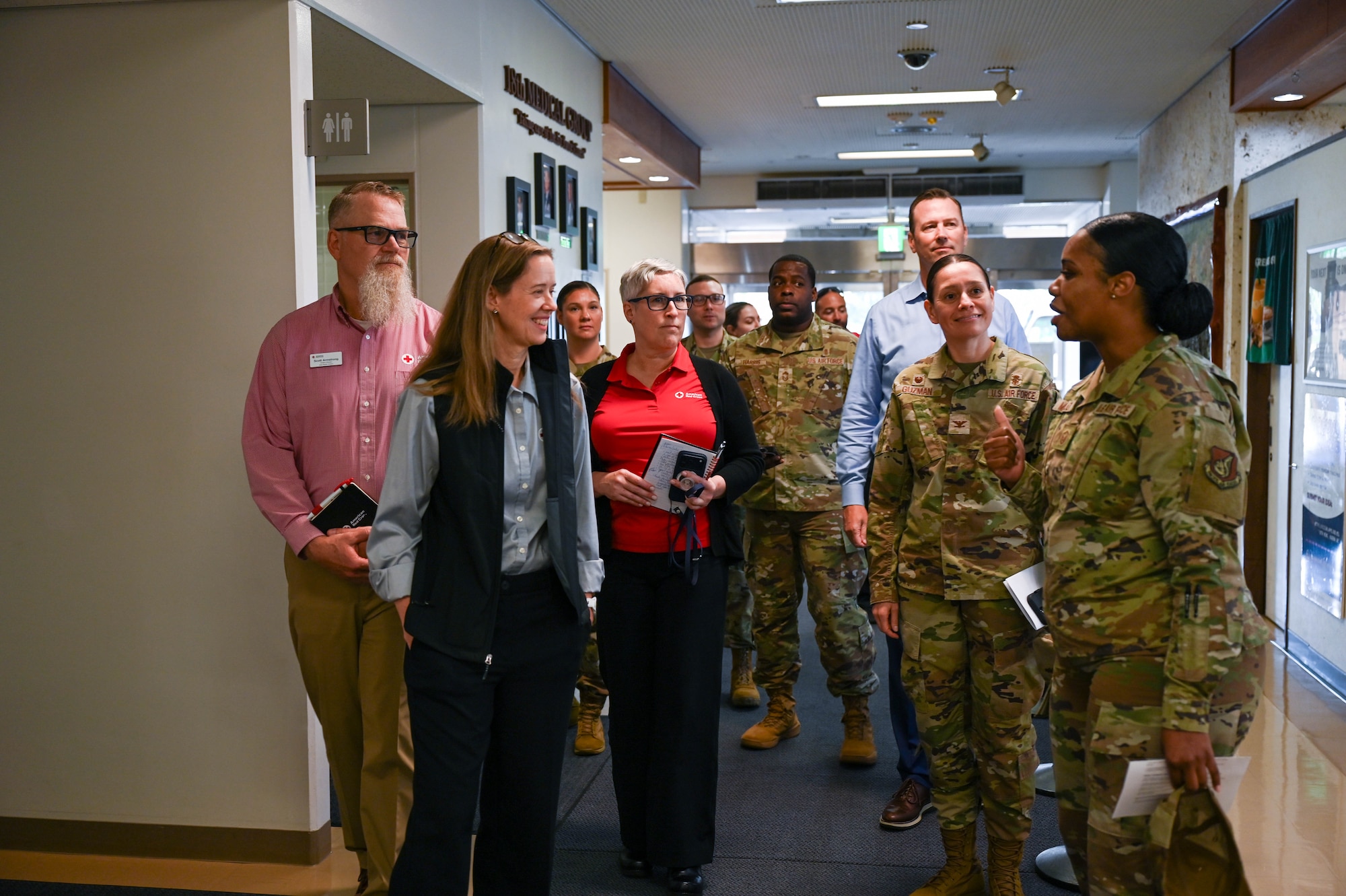 Service members give civilians tour.