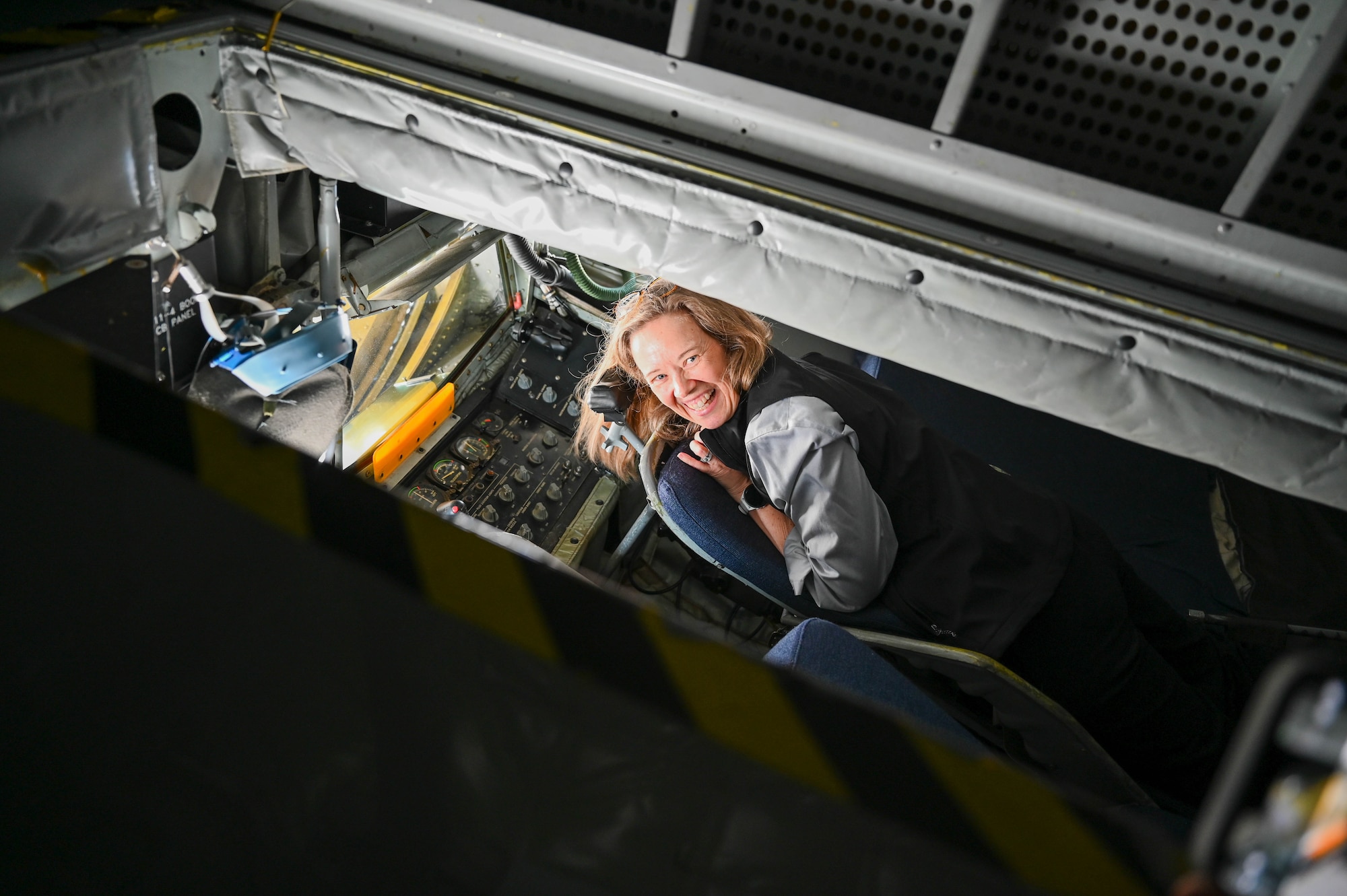 Civilian smiles for photo.