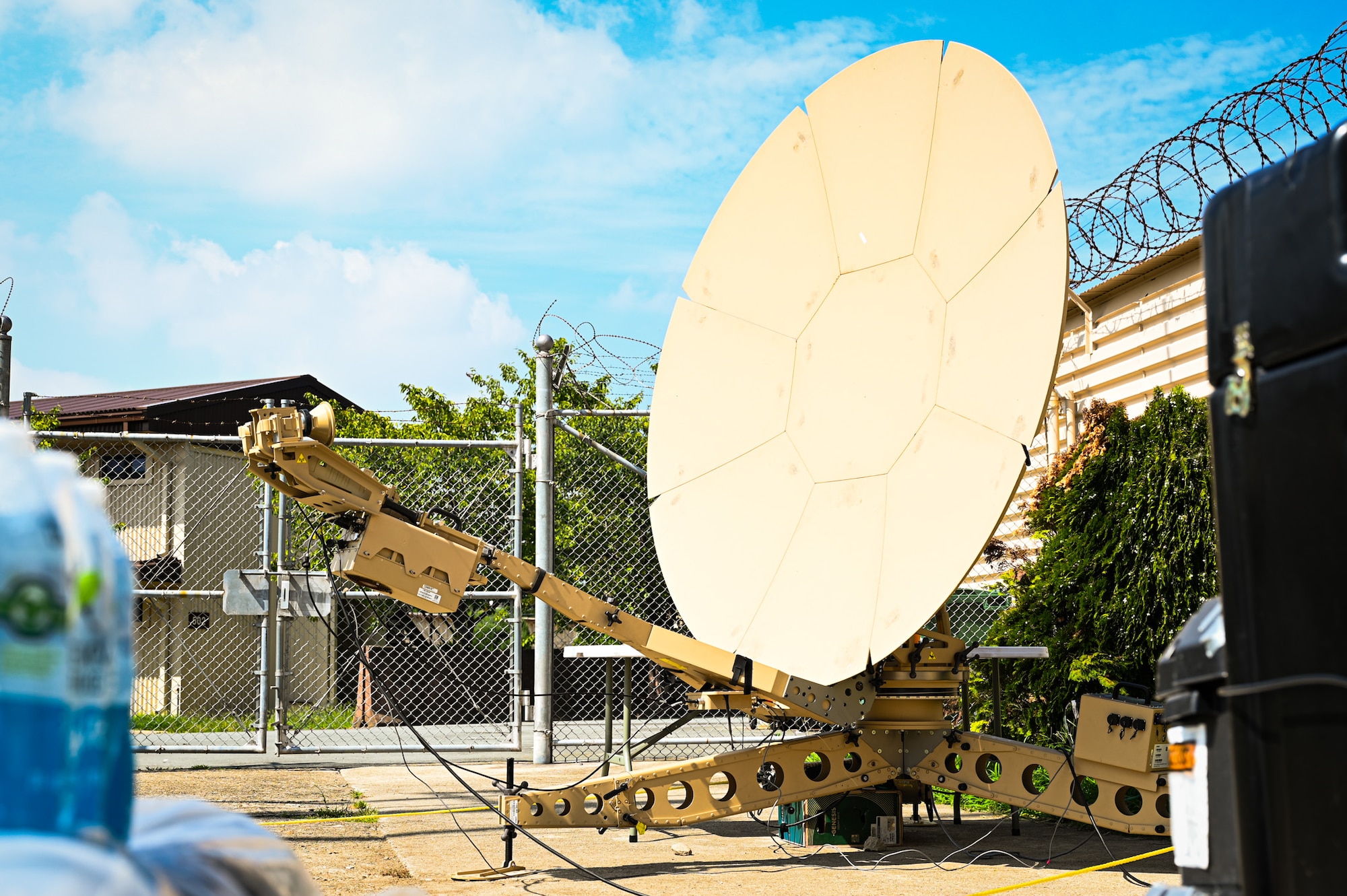 A satellite dish set up by the 51st Combat Communications Squadron sits within a cordoned off area during exercise Ulchi Freedom Shield 25 at Daegu Air Base, Republic of Korea, Aug. 18, 2025. The 51st CBCS supported the 11th Air Task Force during its inaugural deployment to the Pacific, in locations from Saipan to Guam.