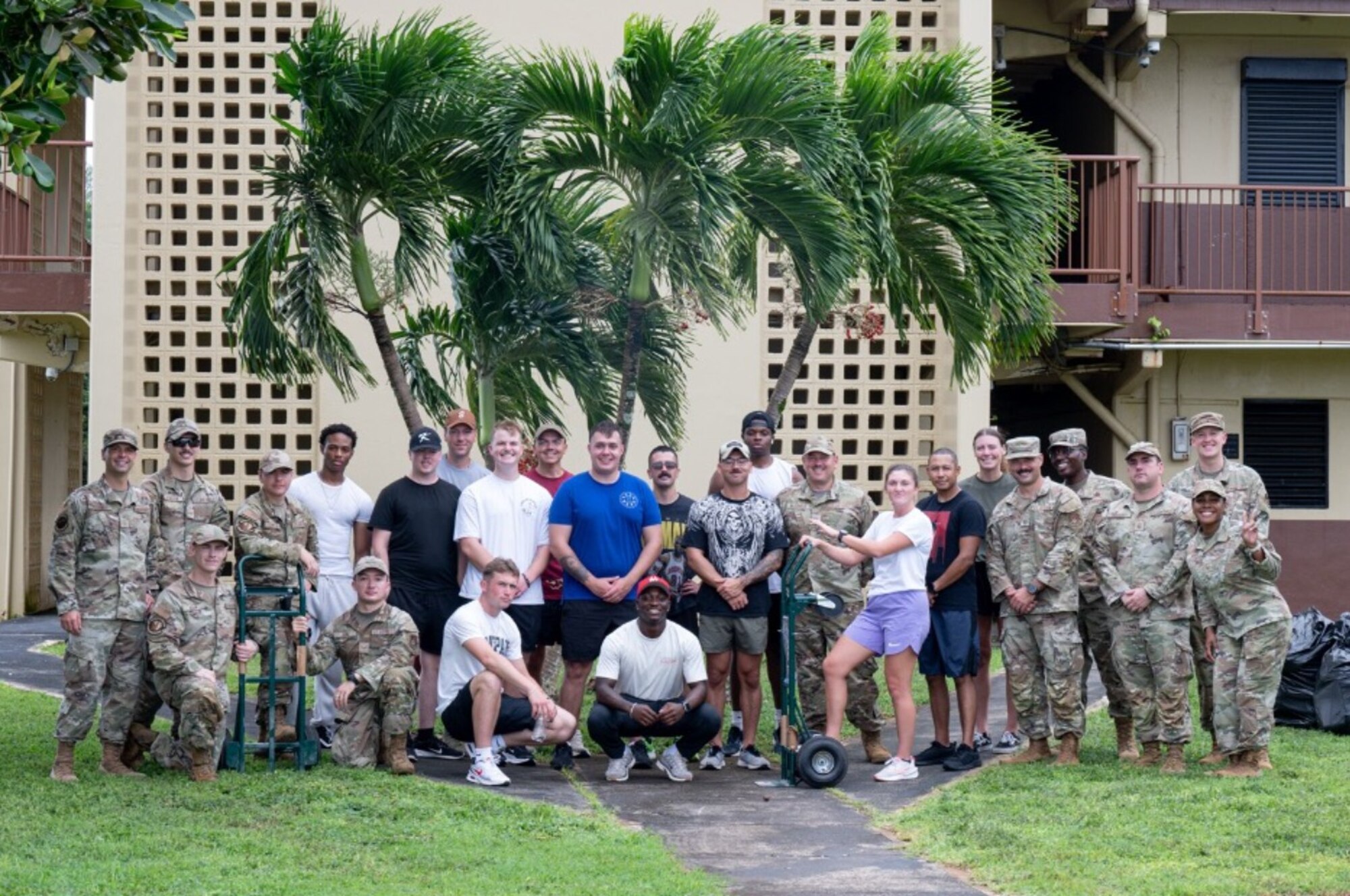 U.S. Air Force Master Sgt. Steven Miller, 11th Air Task Force first sergeant, tours a house clean-up that Airmen from the 11th ATF and 11th Combat Air Base Squadron took part in to assist displaced families at Andersen Air Force Base on Nov. 7, 2025.