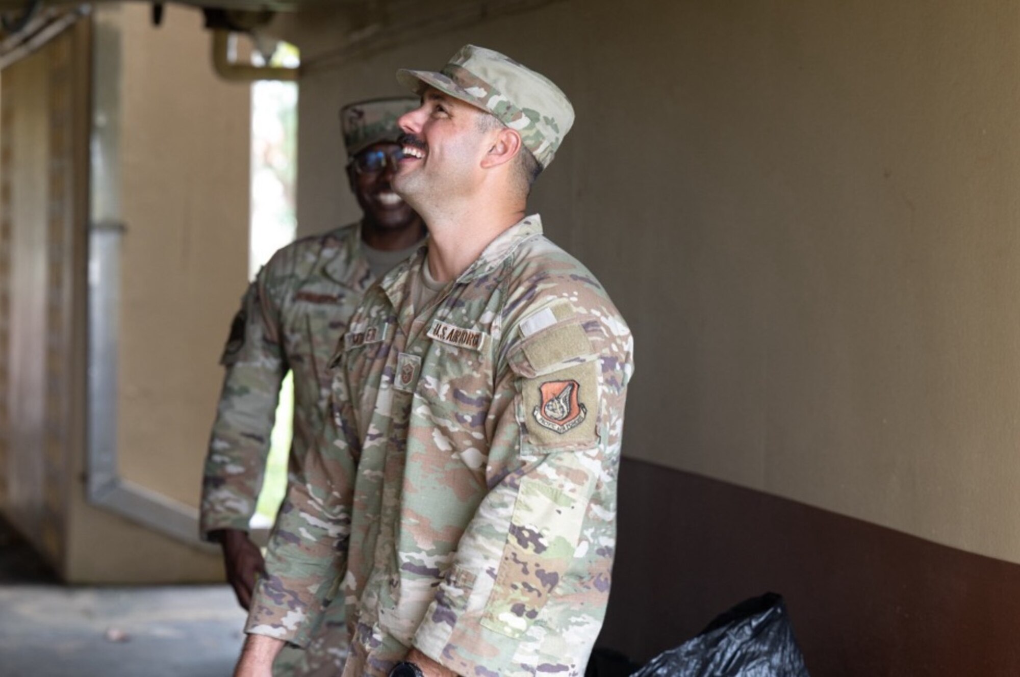 U.S. Air Force Master Sgt. Steven Miller, 11th Air Task Force first sergeant, tours a house clean-up that Airmen from the 11th ATF and 11th Combat Air Base Squadron took part in to assist displaced families at Andersen Air Force Base on Nov. 7, 2025.