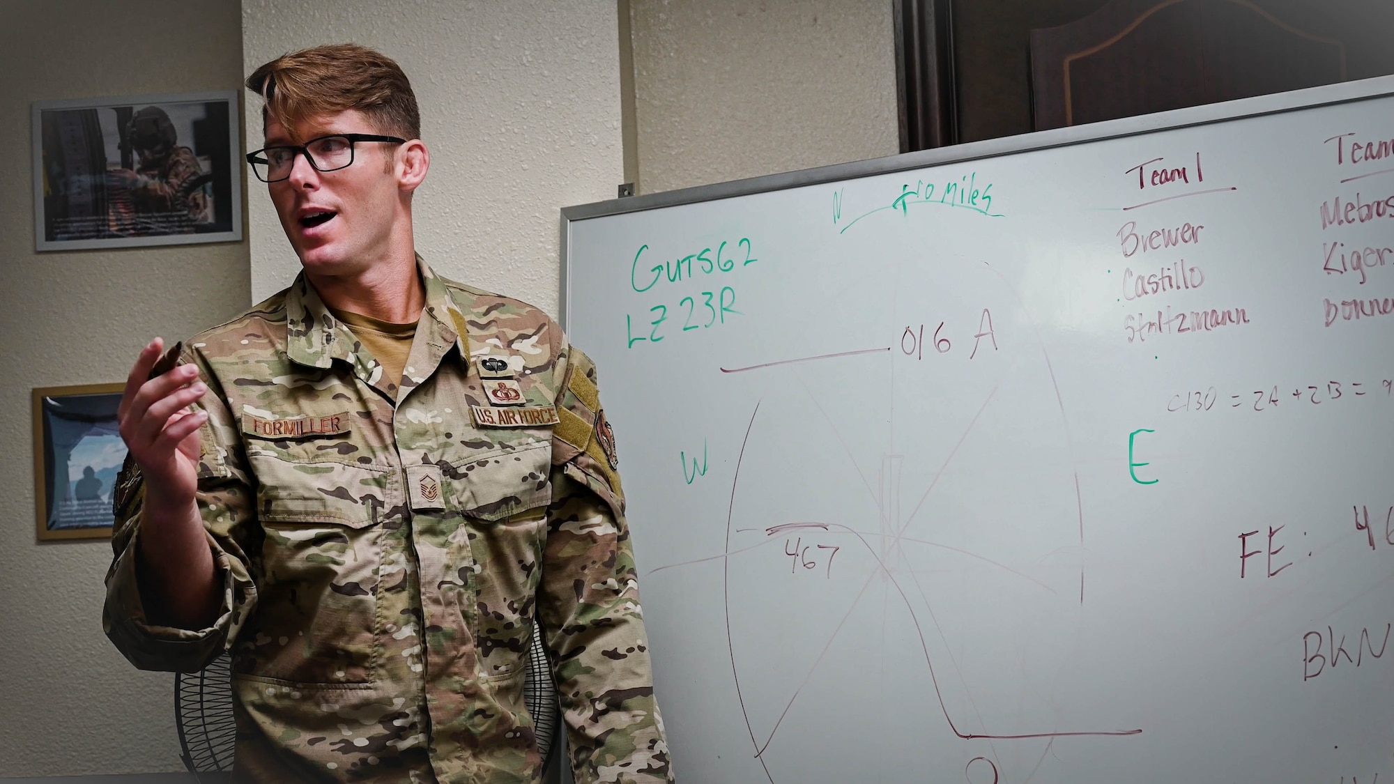 A Master Sgt teaches a class landing zone precautions
