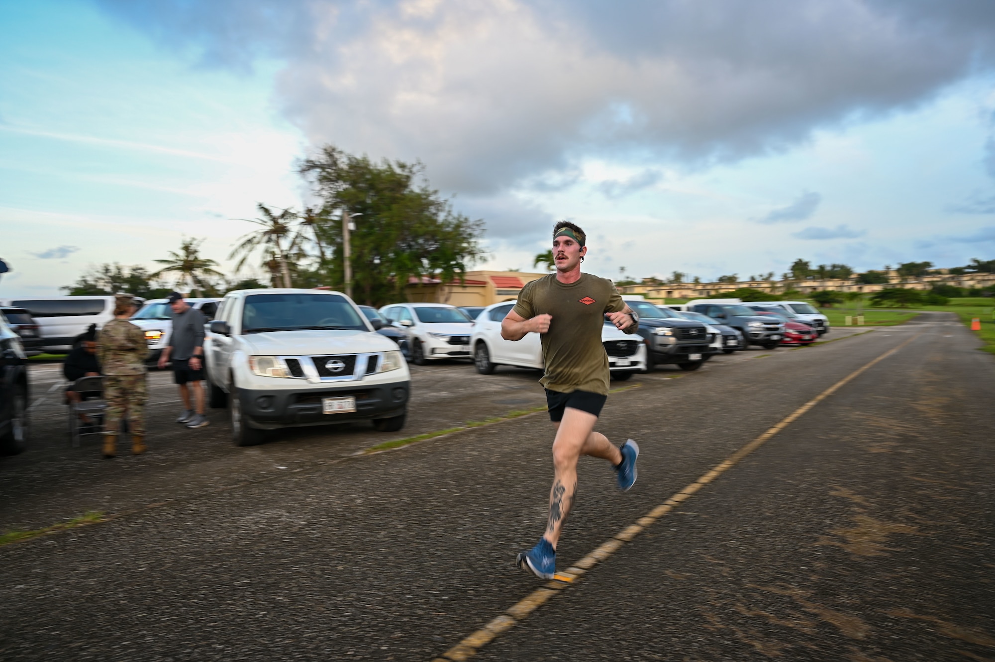 U.S. Air Force Airmen with the 11th Air Task Force pose in their heroic costumes after finishing the Zombie 5K on Halloween at Andersen Air Force Base on Oct. 31, 2025.