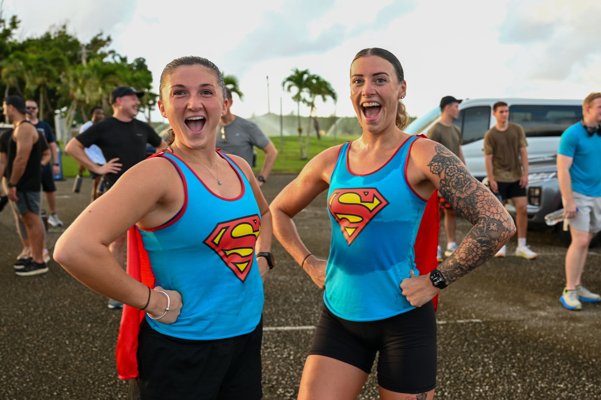 U.S. Air Force Airmen with the 11th Air Task Force pose in their heroic costumes after finishing the Zombie 5K on Halloween at Andersen Air Force Base on Oct. 31, 2025.