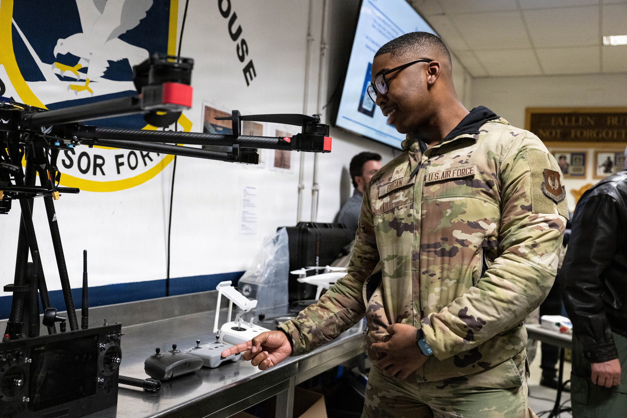 An Airman learns about drone capabilities.