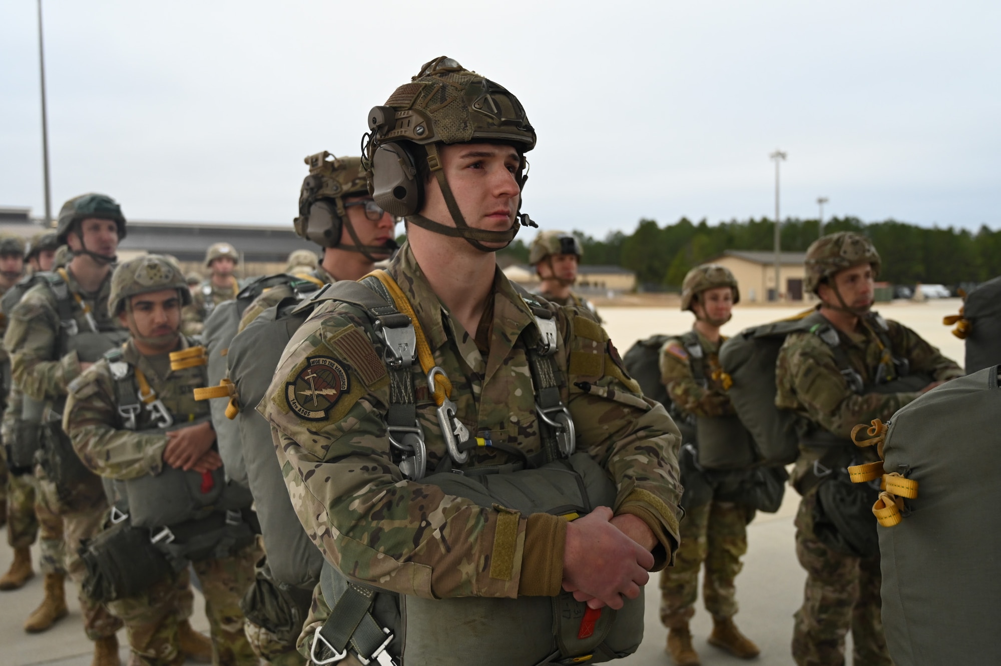 An Airman wait to board an aircraft.