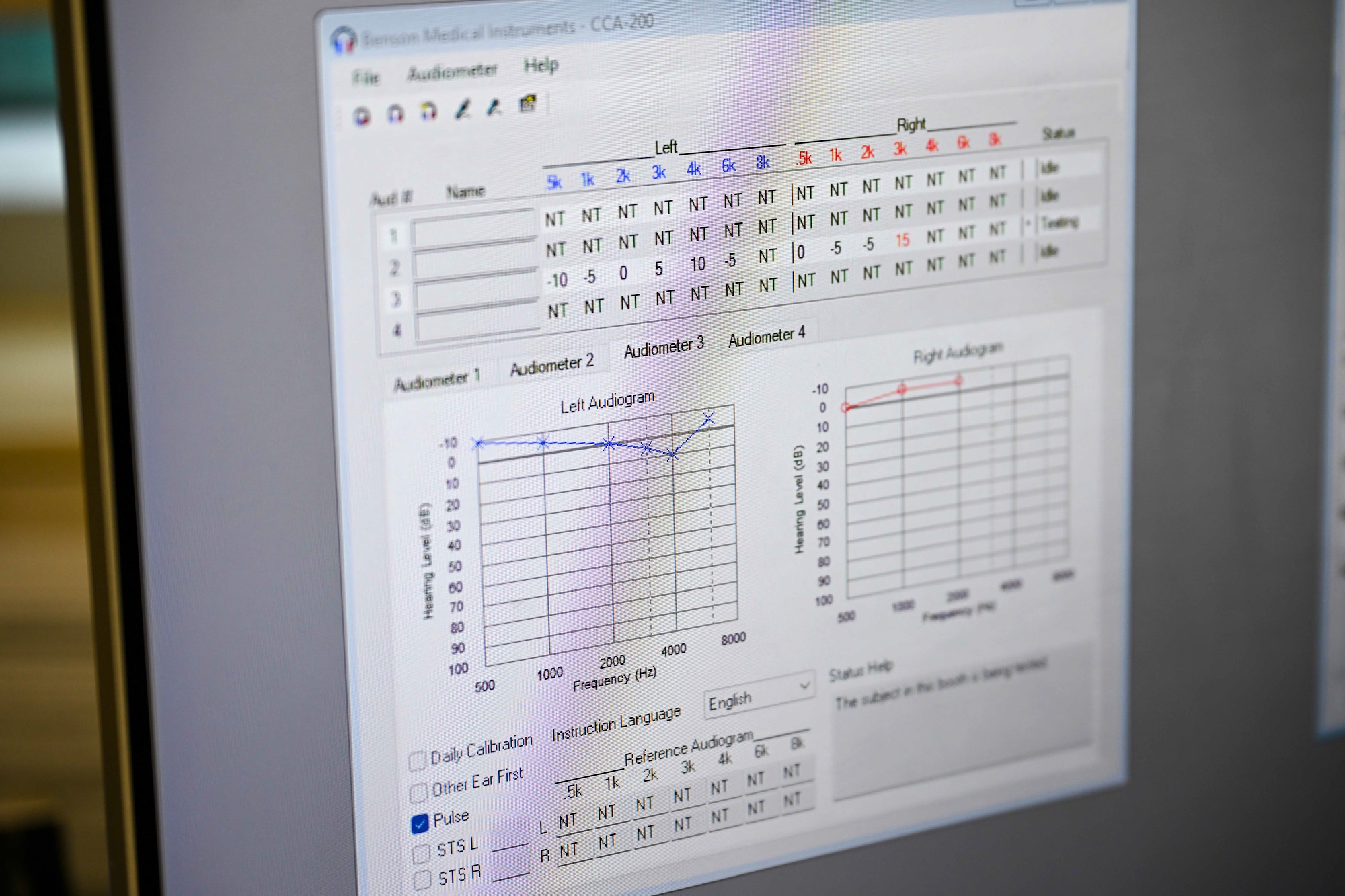 A chart shows hearing test results.