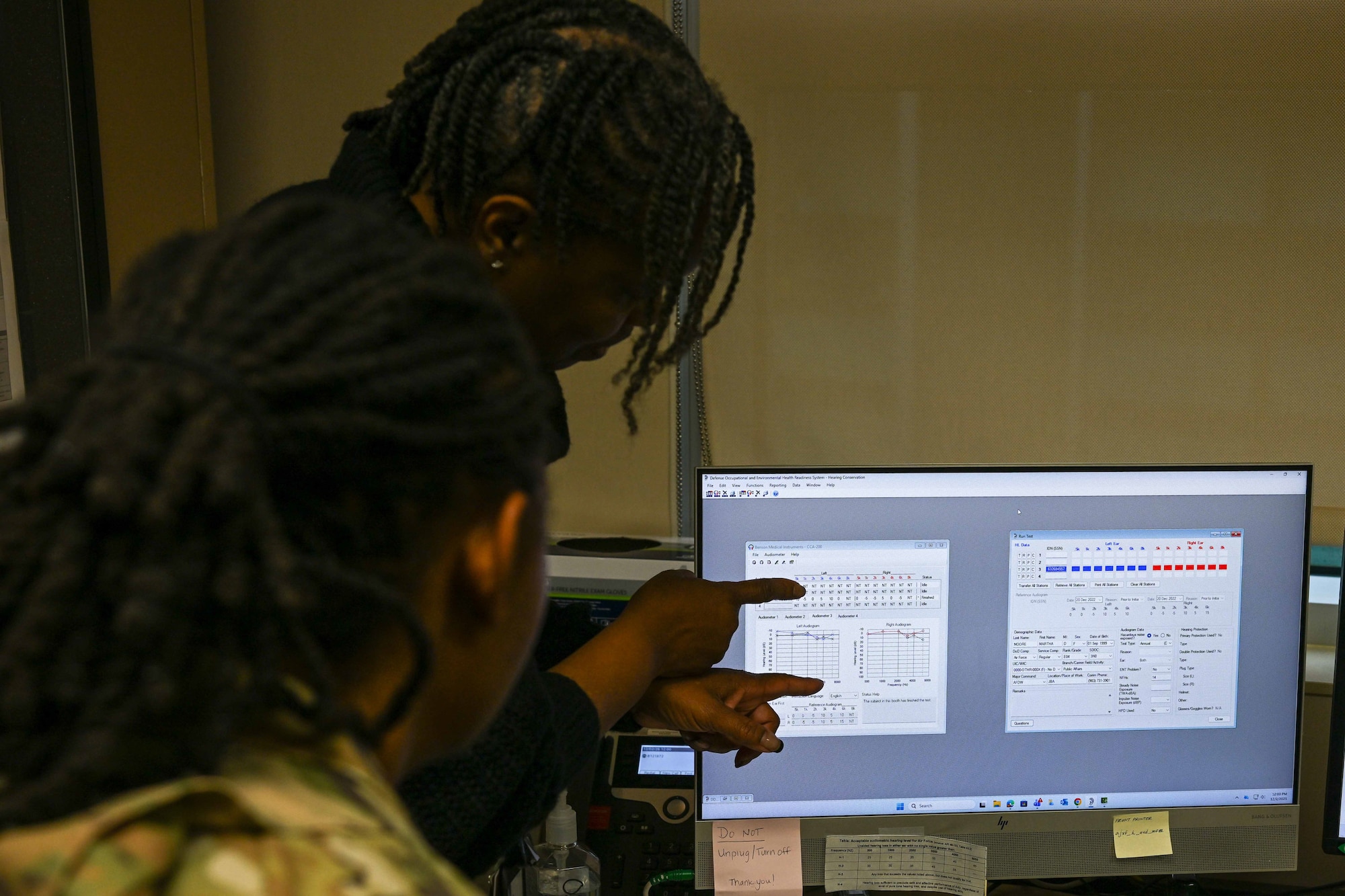 Technician explains hearing test results