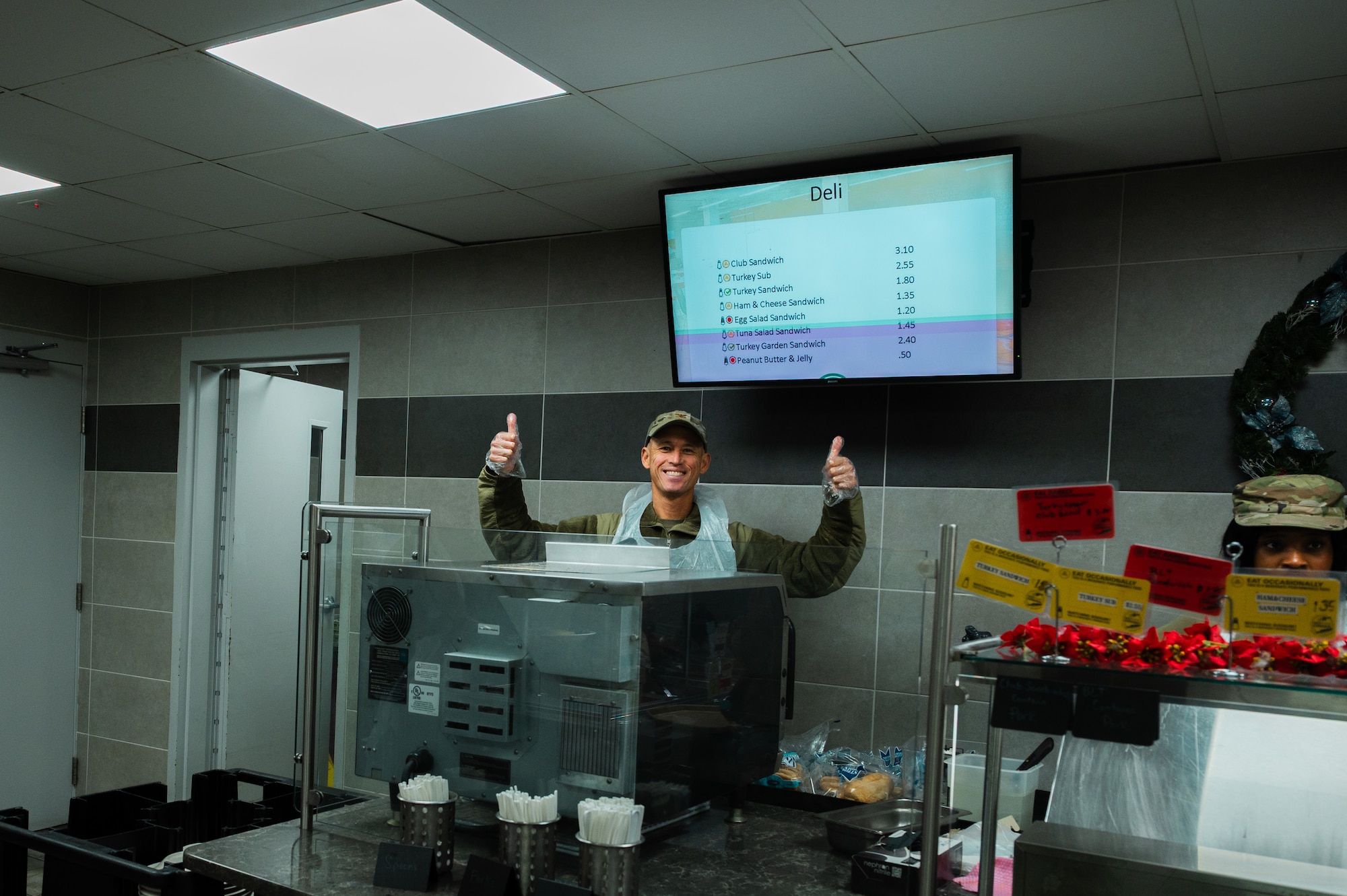 Demonstrating the Air Force core values of Service Before Self and Excellence In All We Do, Airmen of the 459th Air Refueling Wing received a morale-boosting Holiday meal during the December UTA weekend, served by members of the Wing's leadership. The Wing Commander Col. Michael Masuda and Wing Command Chief Chief Master Sgt Anthony Leavitt reinforced their commitment to the Wing's Airmen and Mission by donning aprons and personally taking lead on serving the lunchtime meal, further solidifying unit cohesion and reinforcing the importance of teamwork and selfless service within the 459th. (U.S. Air Force photo by Senior Airman Alexcia Givens)