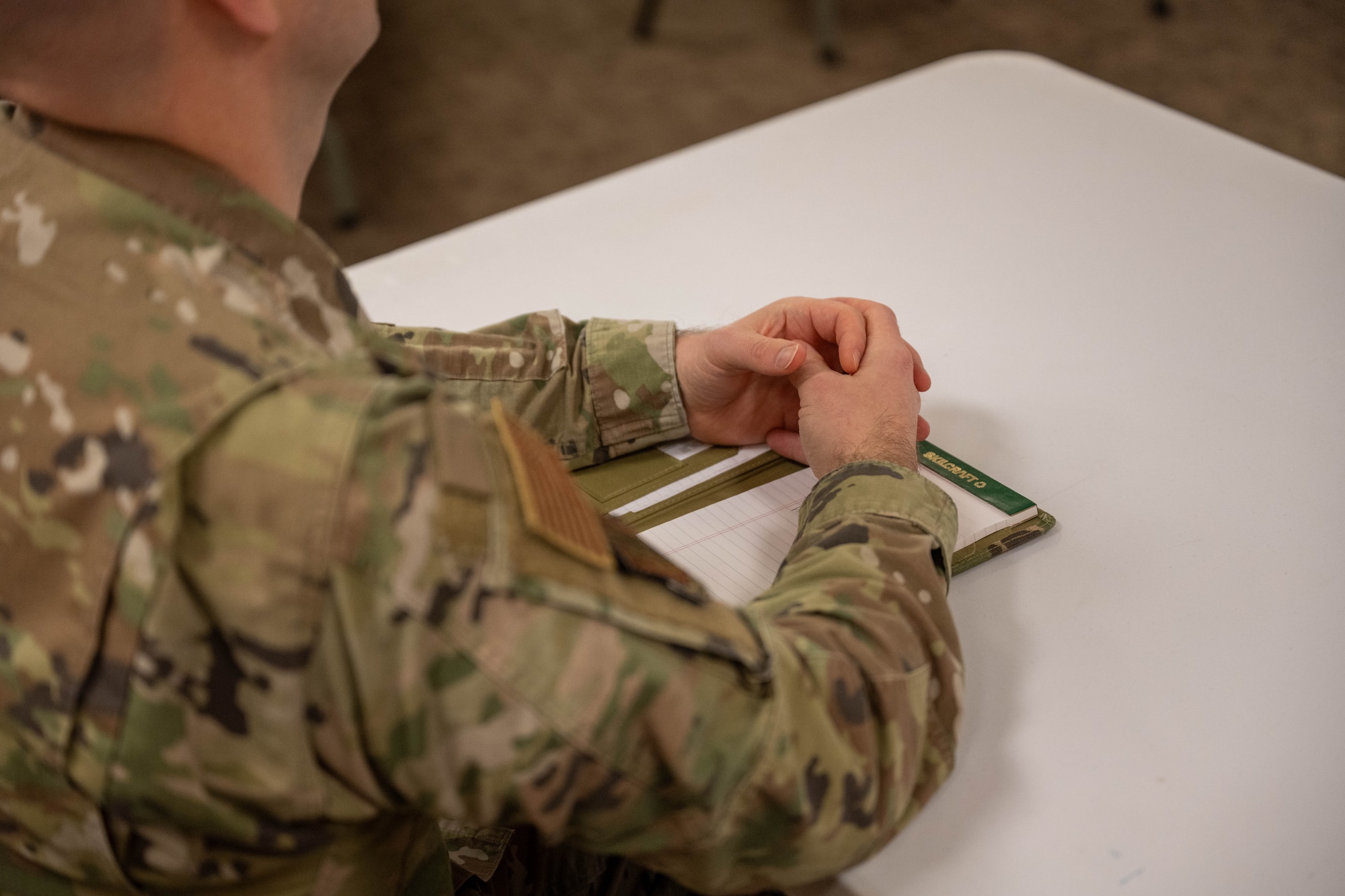 U.S. Air Force Master Sgt. Noel Jones, Base Legal Office superintendent, pays attention to the seminar at Altus Air Force Base, Oklahoma, Dec. 10, 2025. Throughout the 97th Air Mobility Wing 10 Days of Professional Development, attendees enhanced their individual skills and expanded their knowledge. (U.S. Air Force photo by Airman 1st Class Emma Wright)