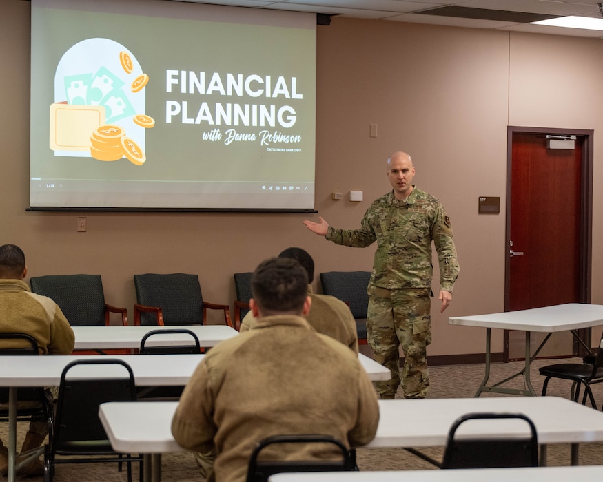 U.S. Air Force Master Sgt. Noel Jones, Base Legal Office superintendent, introduces the presenter for “Financial Planning” at Altus Air Force Base, Oklahoma, Dec. 10, 2025. Jones orchestrated, scheduled, and facilitated the 97th Air Mobility Wing 10 Days of Professional Development. (U.S. Air Force photo by Airman 1st Class Emma Wright)
