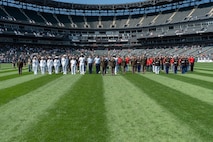 U.S. Service Members and applicants are recognized at a White Sox game at Guaranteed Rate Field, Chicago, Illinois, 11 Sept. 2025. Before the White Sox's September 11th baseball game, applicants for all of the armed services conducted a swear-in ceremony, followed by a moment of silence in recognition of the September 11th attacks in 2001. (U.S. Marine Corps photo by Sgt. Dalton J. Payne)