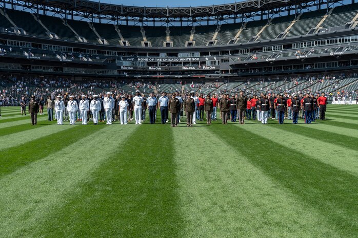 U.S. Service Members and applicants are recognized at a White Sox game at Guaranteed Rate Field, Chicago, Illinois, 11 Sept. 2025. Before the White Sox's September 11th baseball game, applicants for all of the armed services conducted a swear-in ceremony, followed by a moment of silence in recognition of the September 11th attacks in 2001. (U.S. Marine Corps photo by Sgt. Dalton J. Payne)