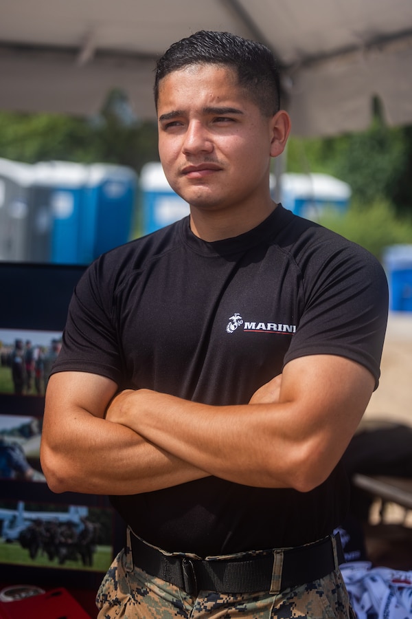 U.S. Marine Corps Sgt. Arturo Paz, a recruiter with Recruiting Station South Chicago, poses for a photo during the Chicago Air and Water Show, in Chicago, Illinois, Aug. 15, 2025. The Marines attended the show in support of community relations and recruiting efforts. The Chicago Air and Water Show presented by the City of Chicago is the largest free show of its kind in the United States. (U.S. Marine Corps photo by Cpl. Maxwell Cook)