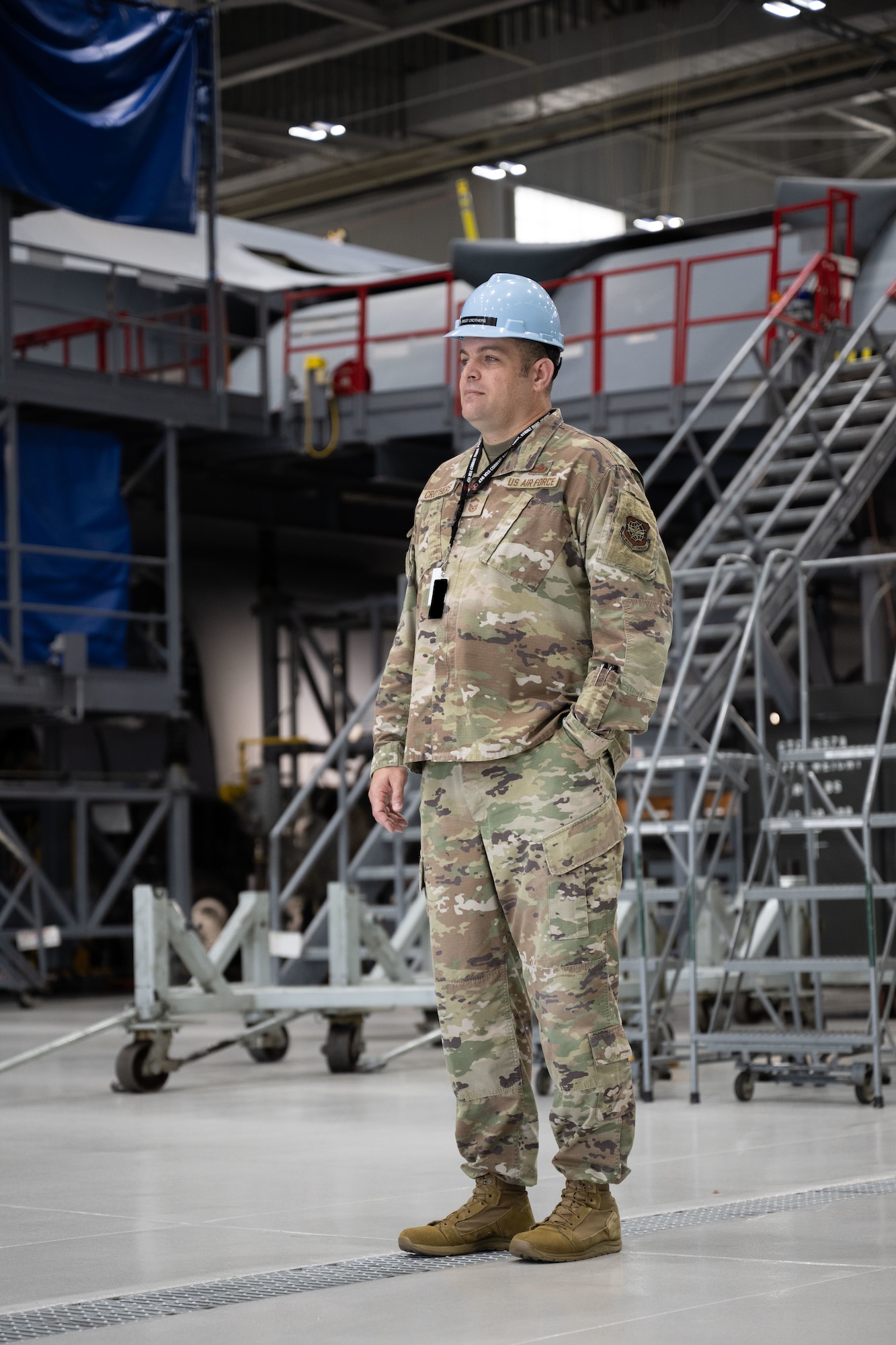 U.S. Air Force Senior Master Sgt. Adam Crothers, 436th Maintenance Squadron maintenance superintendent, poses for a photo at the 436th MXS Isochronal Inspection Dock on Dover Air Force Base, Delaware, Oct. 15, 2025. Crothers’ story signifies generational military service, highlighting the importance of family and commitment in the U.S. military. (U.S. Air Force photo by Airman 1st Class Liberty Kuhn)